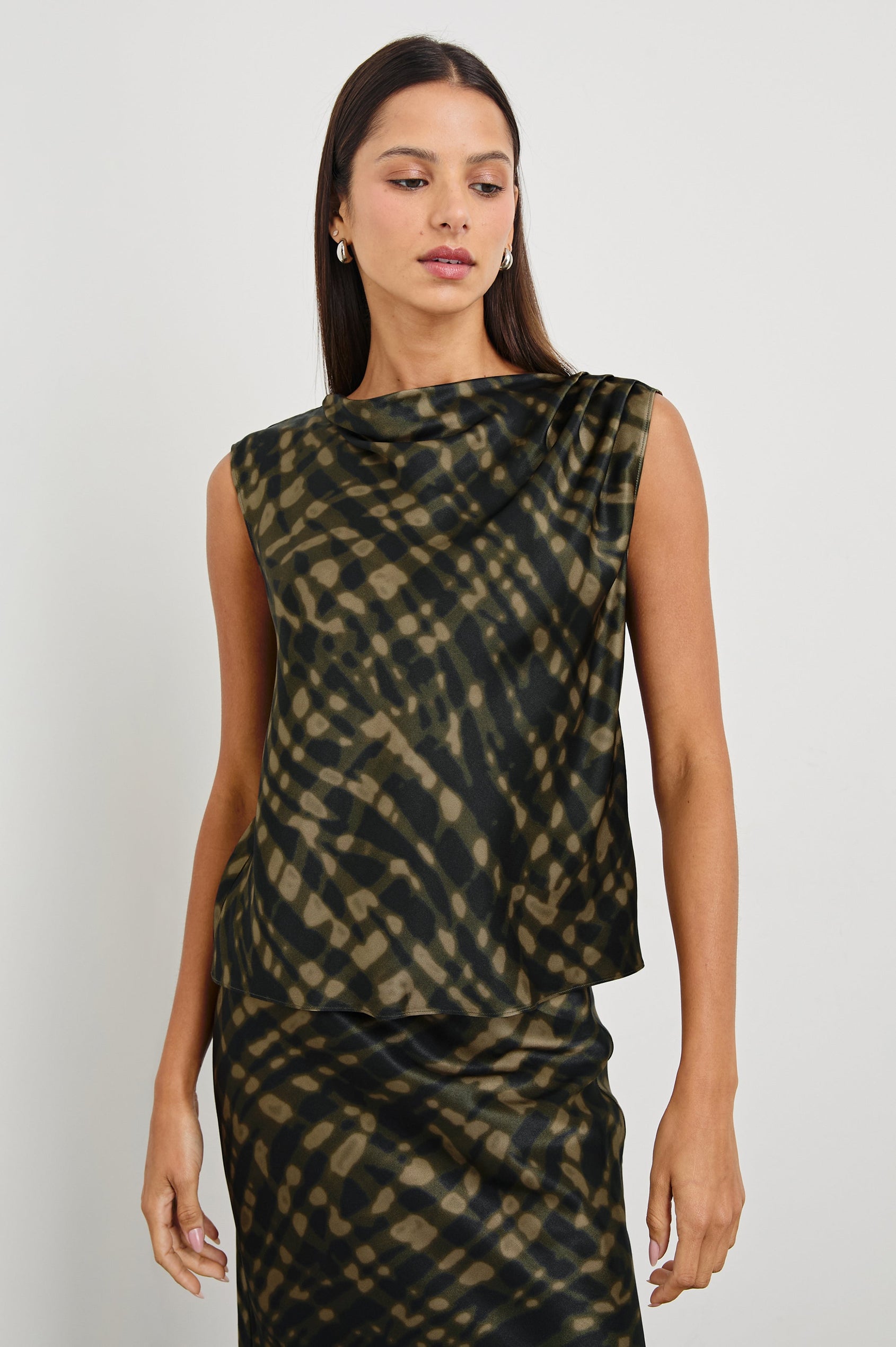 Lilly Sleeveless Top with a Cowl Neckline in Cypress Colorway, a Print in Black and Greens - Front View Featured on Model