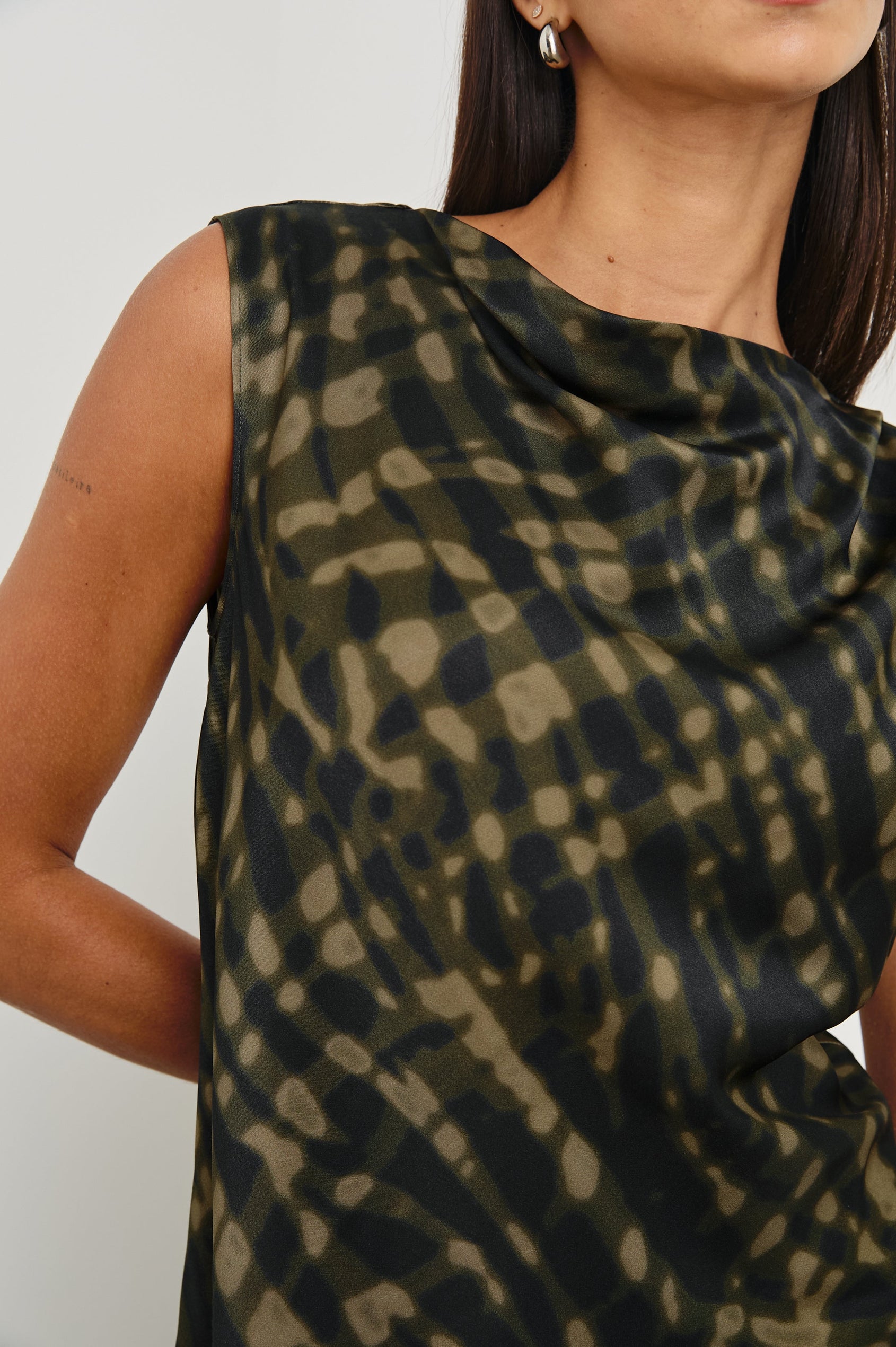 Lilly Sleeveless Top with a Cowl Neckline in Cypress Colorway, a Print in Black and Greens - Front View Featured on Model