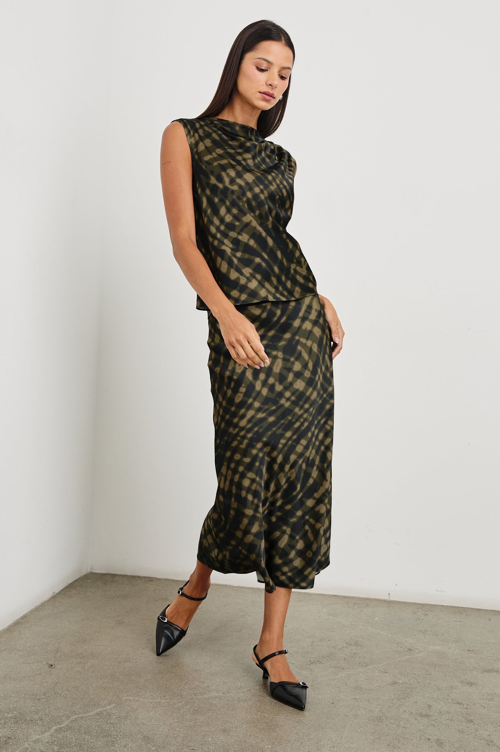 Lilly Sleeveless Top with a Cowl Neckline in Cypress Colorway, a Print in Black and Greens - Front Full Body View Featured on Model