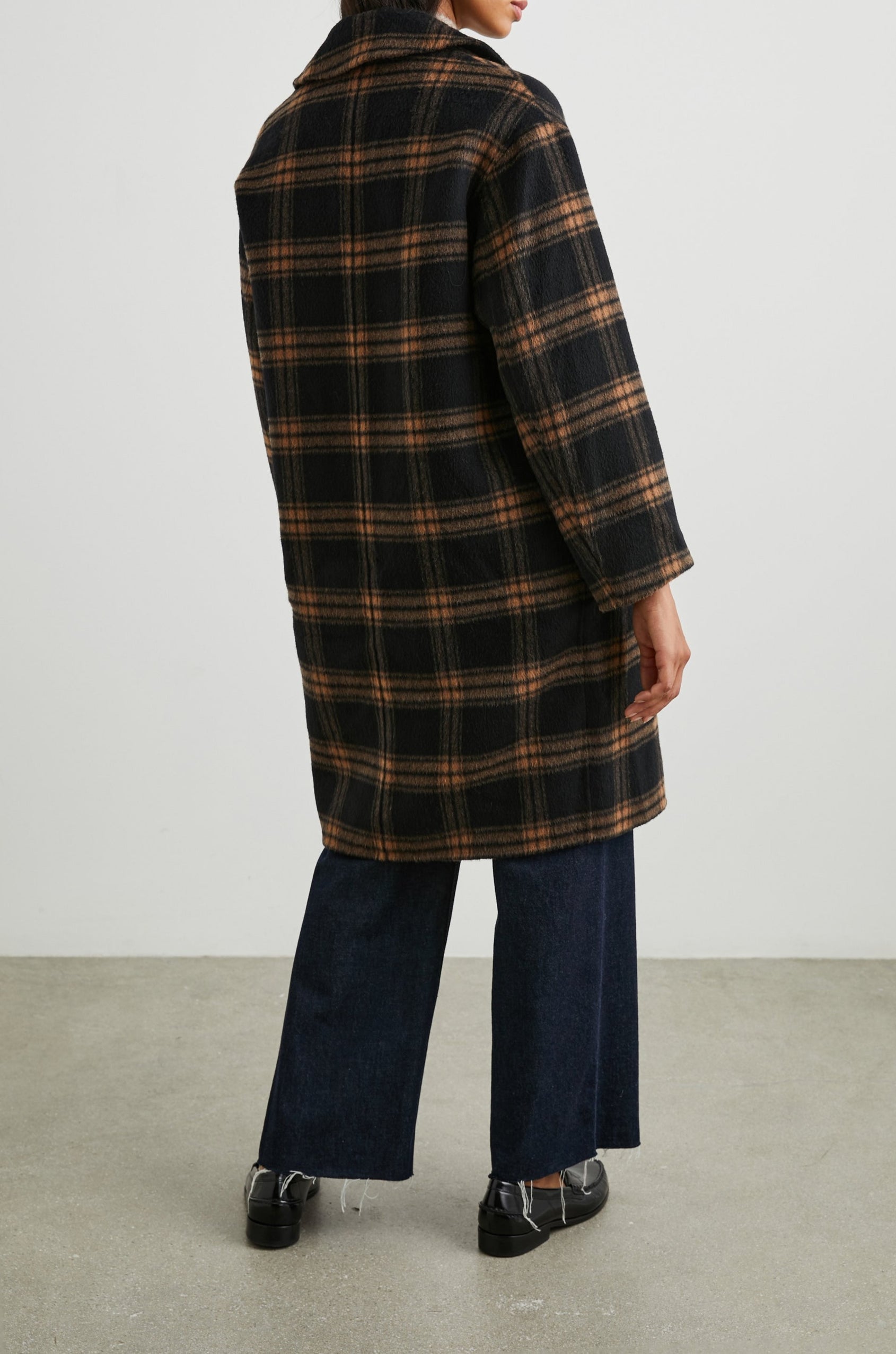Lore Knee-Length Coat with Two Button Closure, Notched Lapels and Two Front Pockets in Camel Jet Colorway, a Plaid - Back Full Body View Featured on Model