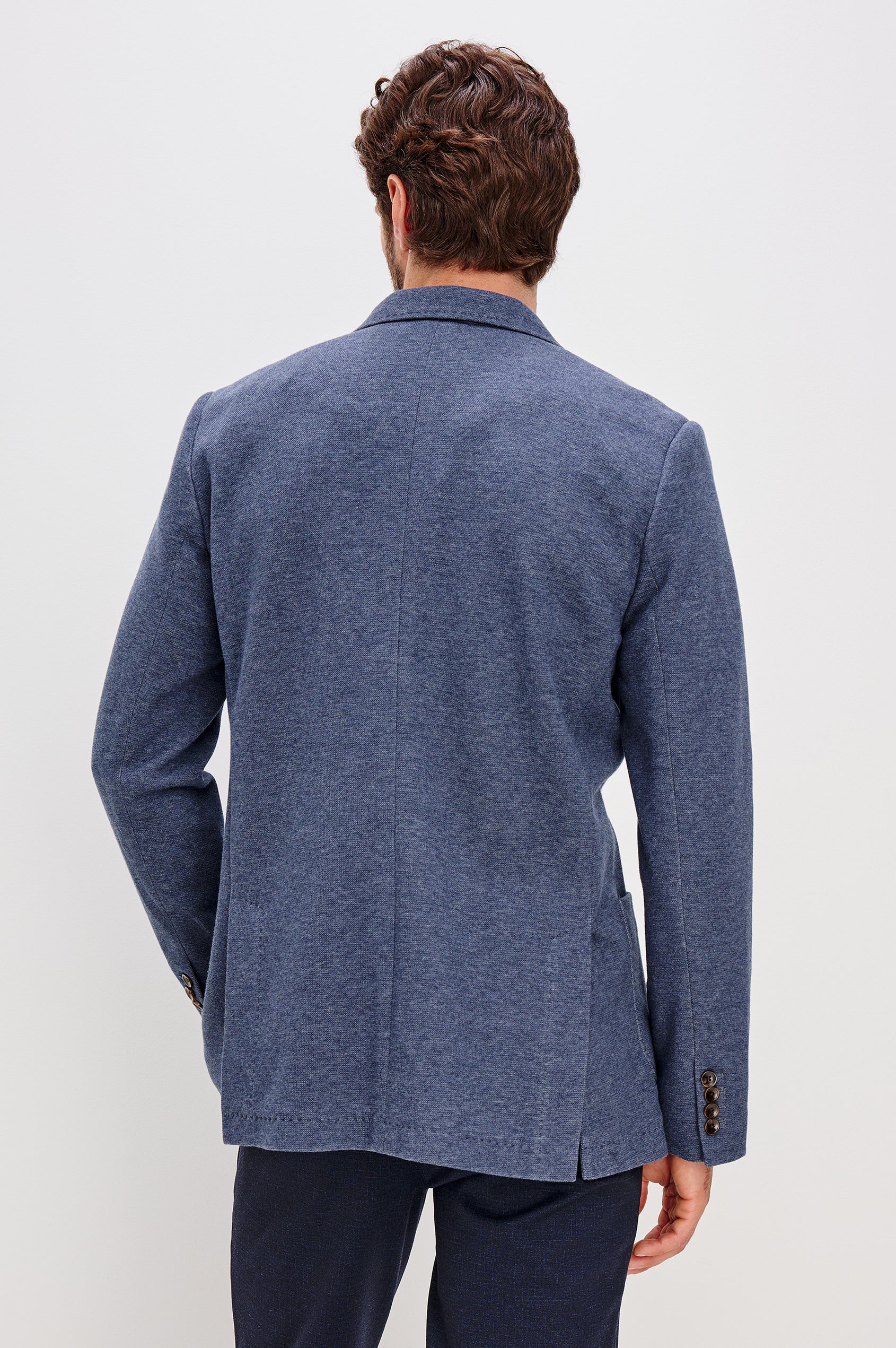Lorenz Single Breasted Blazer with two patch pockets and one chest pocket in Navy Heather Colorway. Back View Shown on Model.