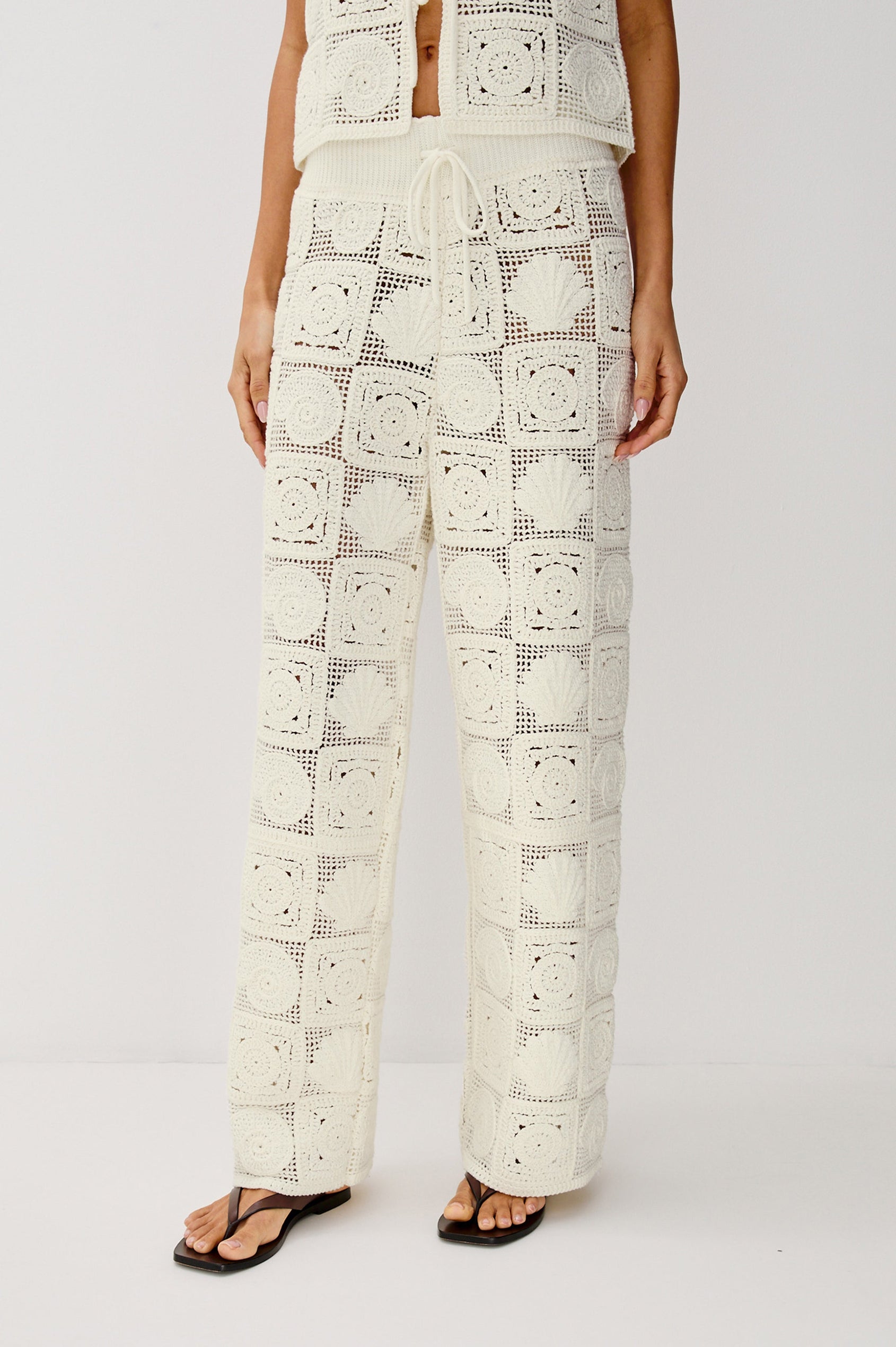 Maja Straight Leg Pant with Ribbed Drawstring Waistband in White Sea Shell Crochet Colorway. Front View Shown on Model.