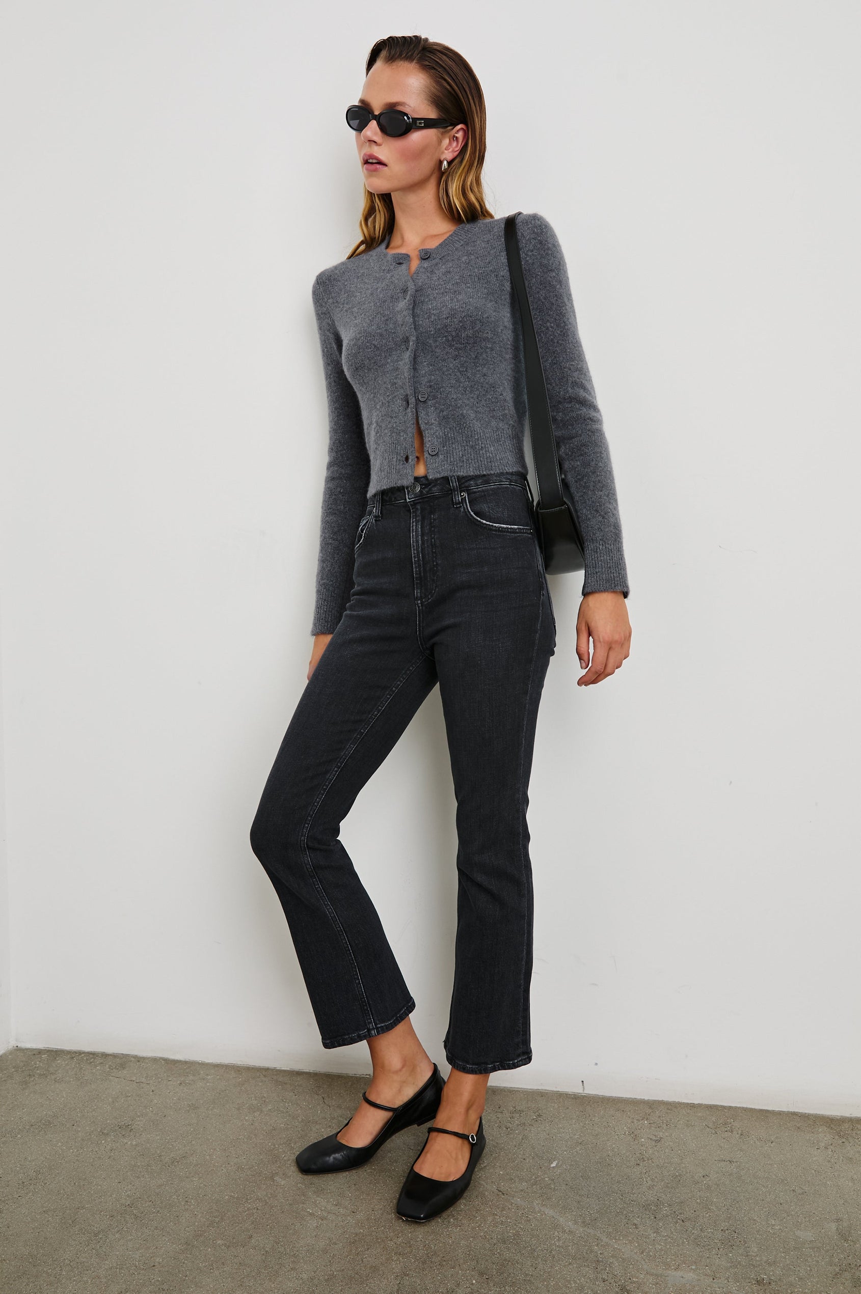 Matilda Cropped Long-Sleeve Sweater with Button Closure, Crew Neck and Ribbed Trim in Charcoal Colorway - Front Full Body View Featured on Model