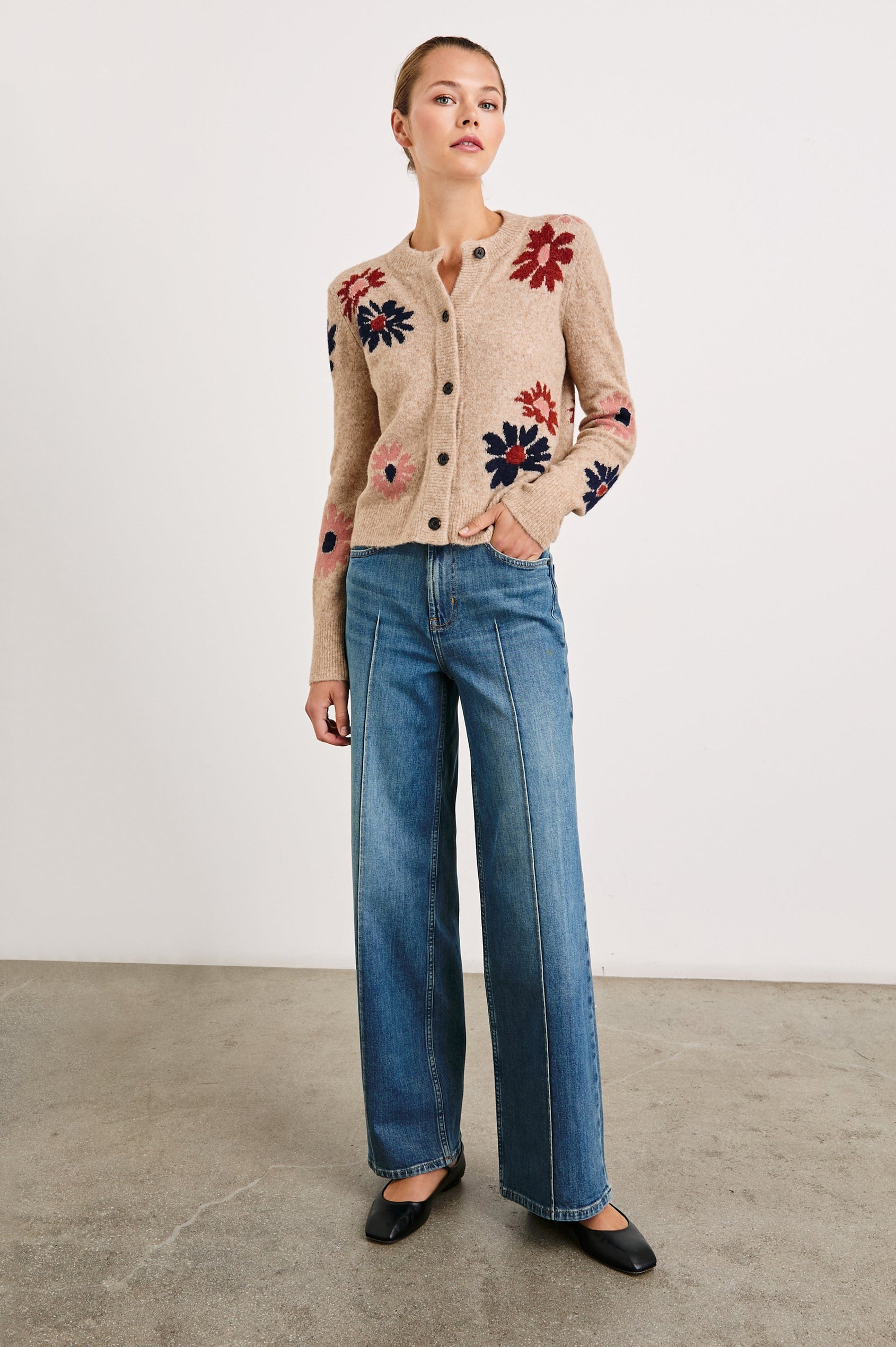 Millie Long-Sleeve Sweater with Front Button Closure, a Crew Neck and Ribbed Trim in Mauve Meadow Colorway, Flowers in Pink, Navy and Red on Oatmeal - Front Full Body View Featured on Model