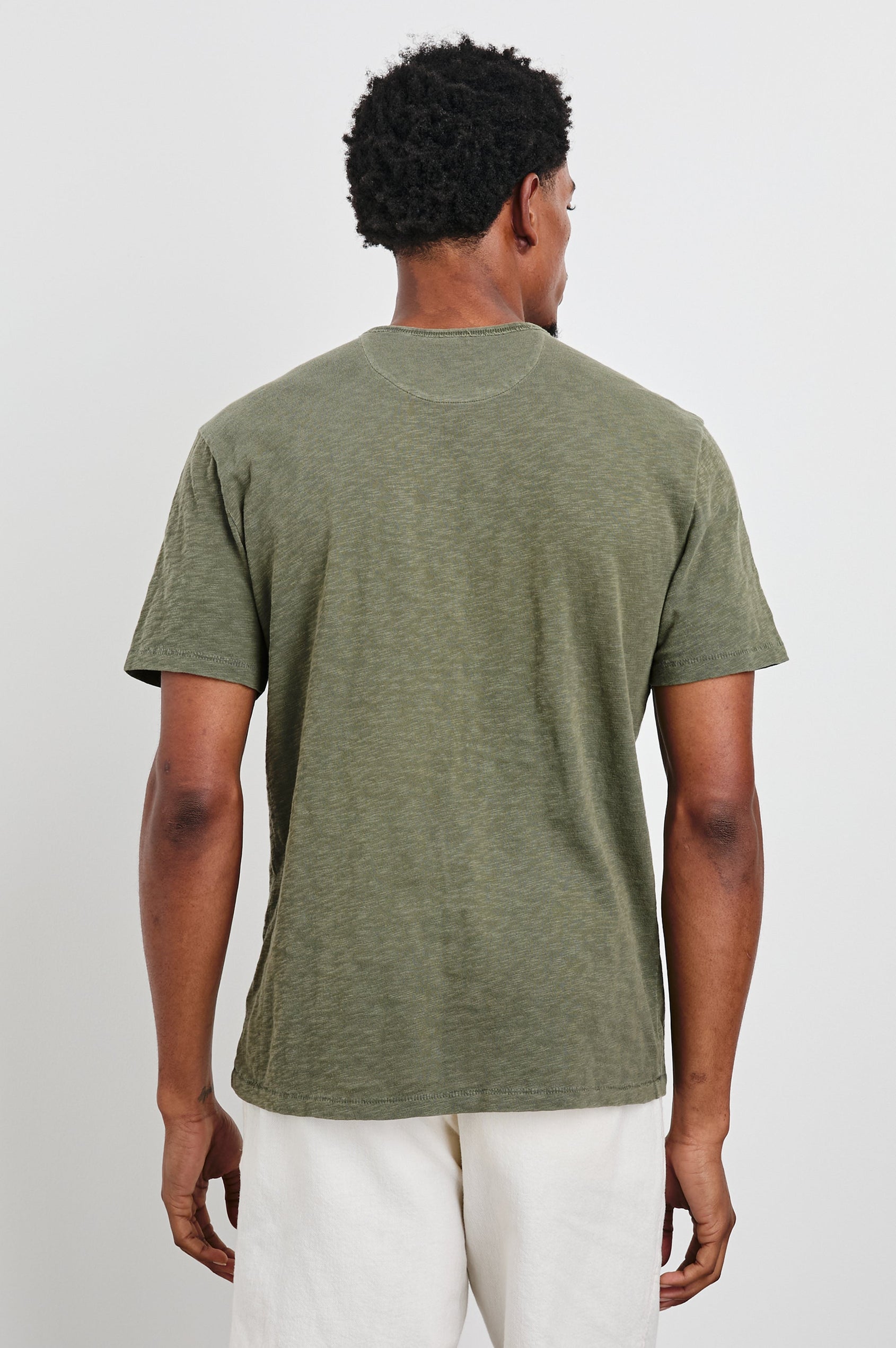 Neil T-Shirt with a Crew Neck in Surplus Colorway - Back View Featured on Model