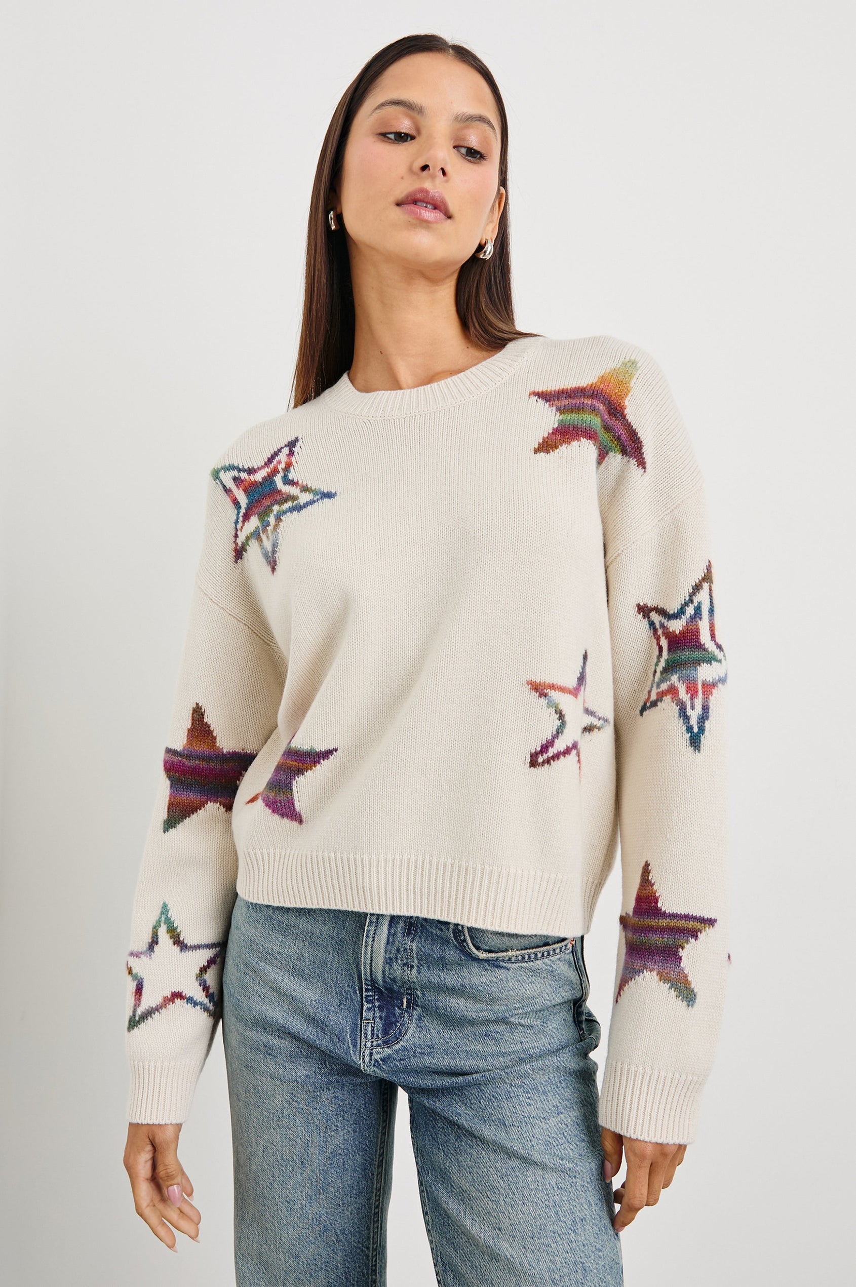 Perci Long-Sleeved Sweater with Crew Neck and Ribbed Trim in Ivory Rainbow Multi Stars Colorway, Rainbow Stars on Ivory - Front View Featured on Model