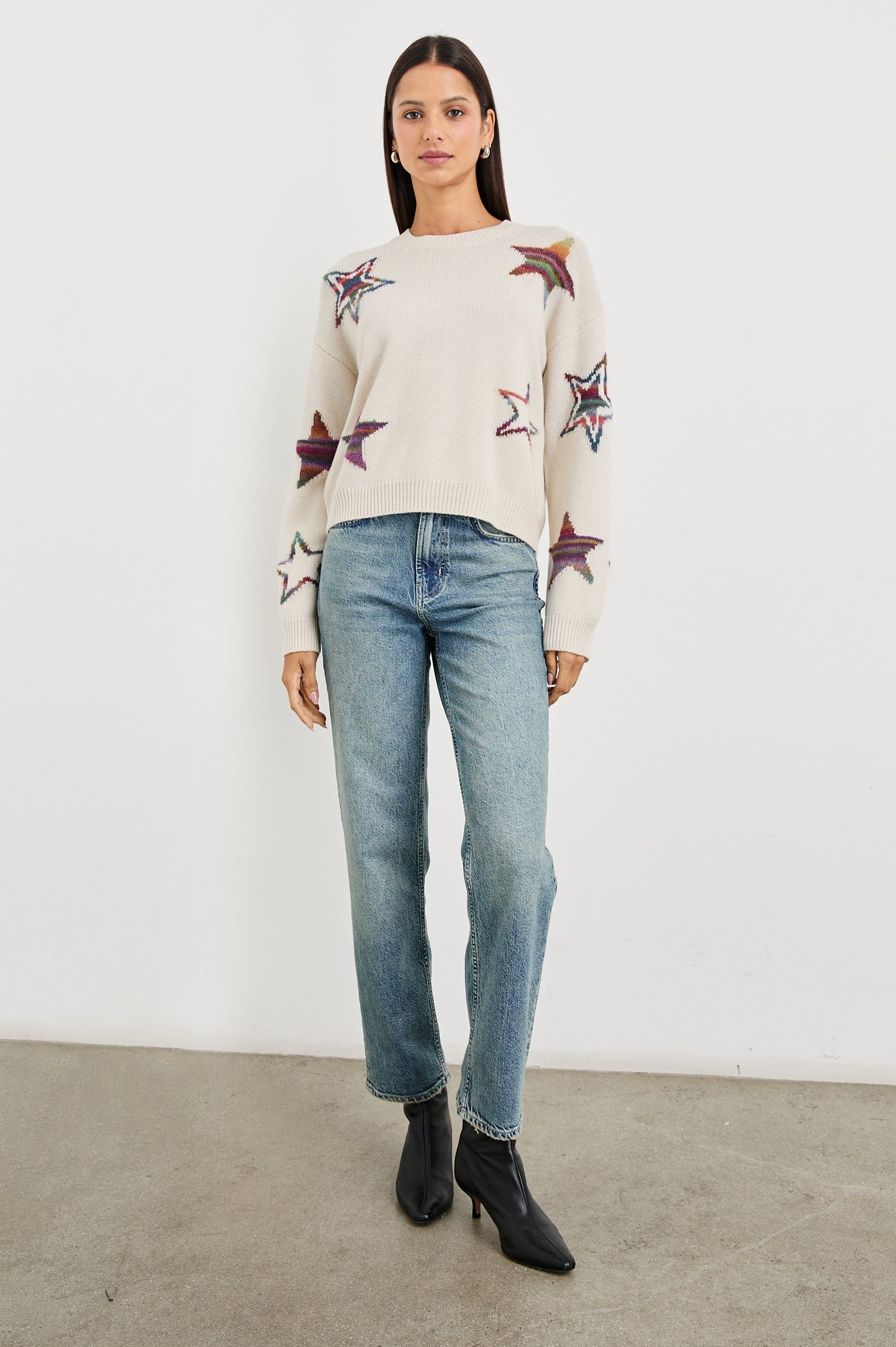Perci Long-Sleeved Sweater with Crew Neck and Ribbed Trim in Ivory Rainbow Multi Stars Colorway, Rainbow Stars on Ivory - Front Full Body View Featured on Model