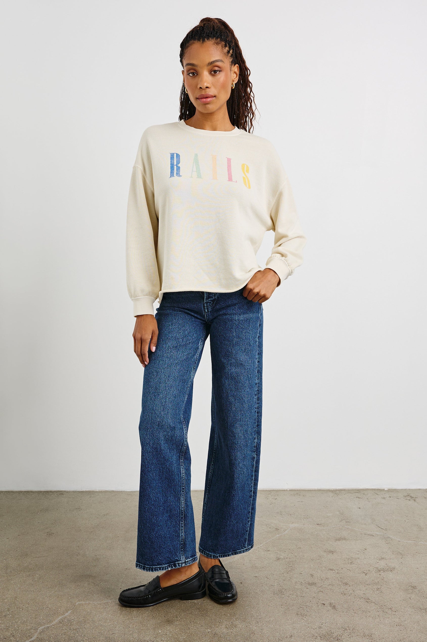 Rails Signature Long-Sleeve Sweatshirt with a Crew Neck, Raw Hem, Shirring Above Cuff, and the Text, Rails, in Ivory Colorway, with Multi Colored Text - Front Full Body View Featured on Model