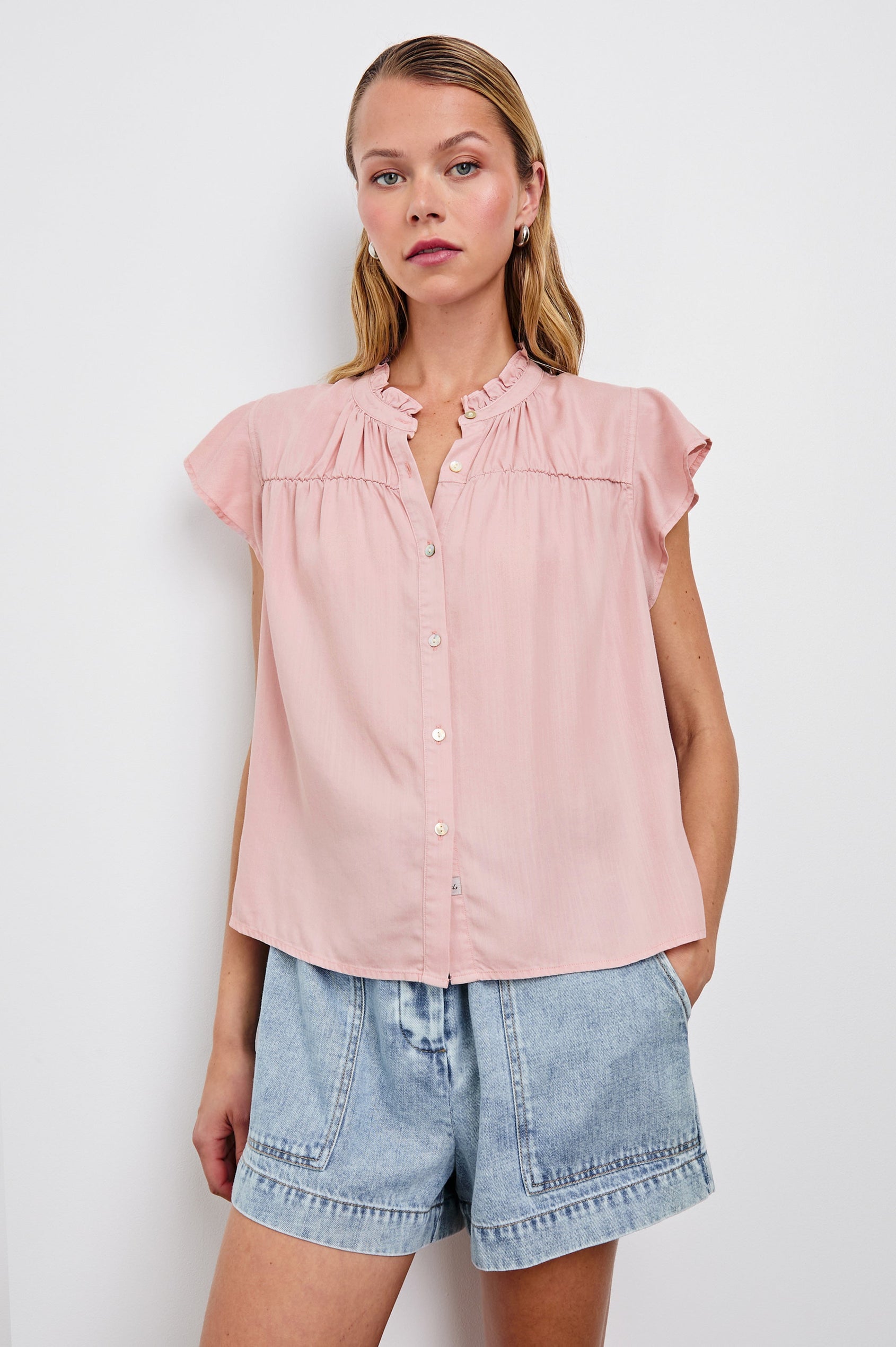 Ruthie Top with Flutter Cap Sleeves, a Ruffled Banded Collar, Buttons Down the Front, and Soft Shirring at Front Yoke in Dusty Rose Colorway - Front View Featured on Model