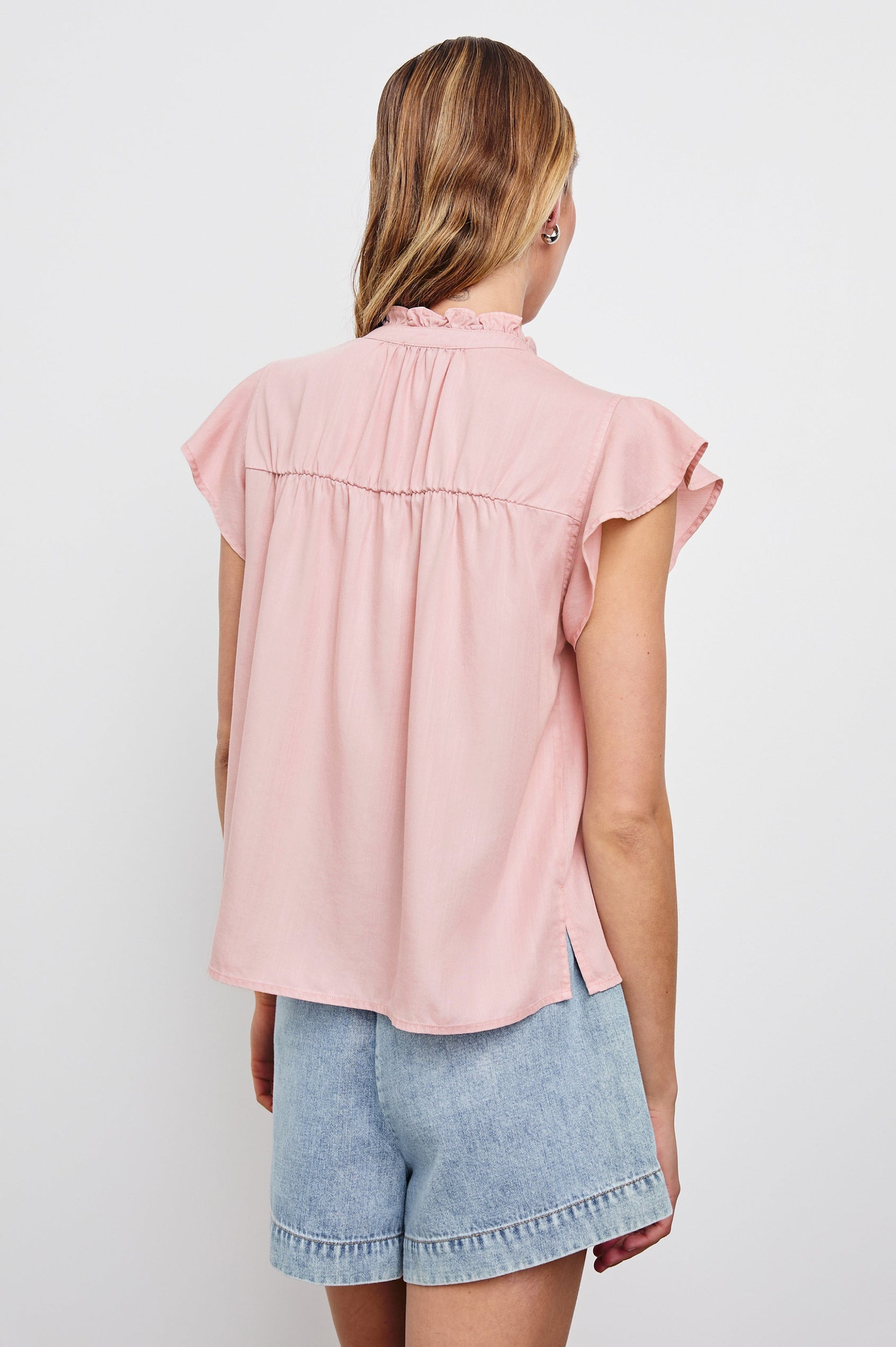 Ruthie Top with Flutter Cap Sleeves, a Ruffled Banded Collar, Buttons Down the Front, and Soft Shirring at Front Yoke in Dusty Rose Colorway - Back View Featured on Model