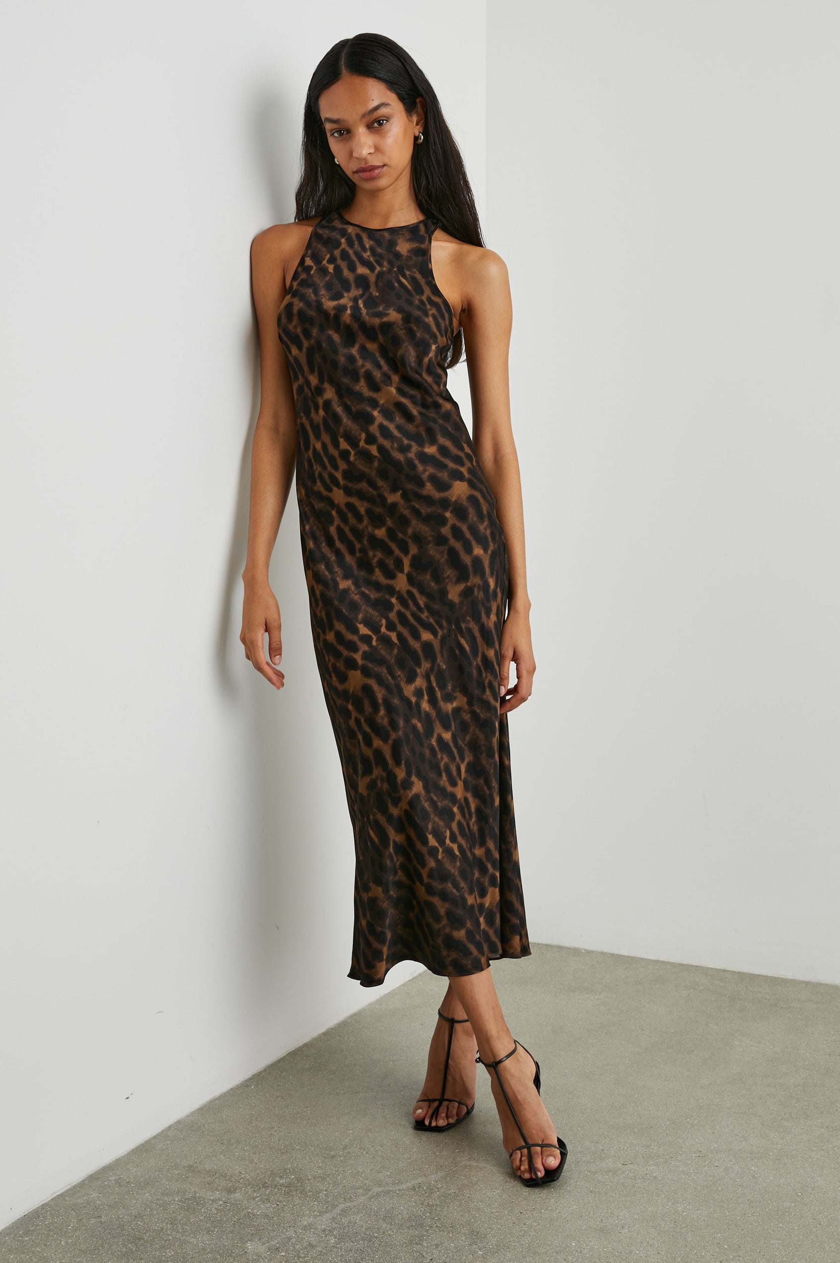 Solene Sleeveless Midi Dress with a Crew Neck and a Tie Keyhole at the Back in Umber Leopard Colorway, Black Leopard Spots on Umber - Front Full Body View Featured on Model