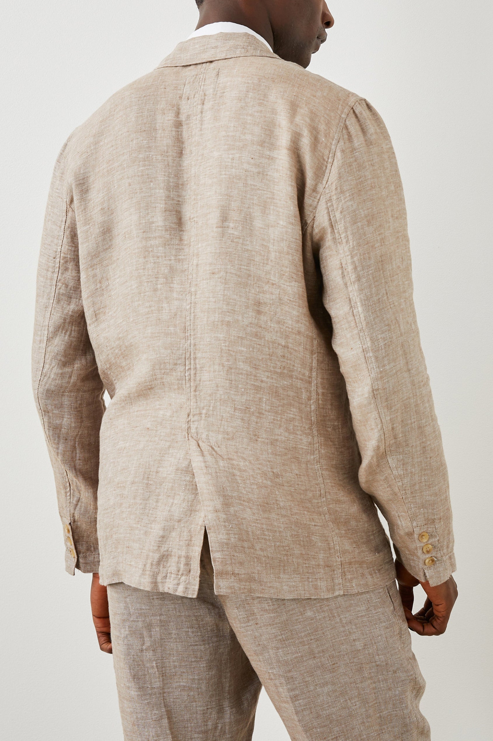 Sorrento Blazer with Two Button Closure, Two Front Flap Pockets, a Chest Patch Pocket and Three-Button Cuffs in Bulgur Colorway - Back View Featured on Model