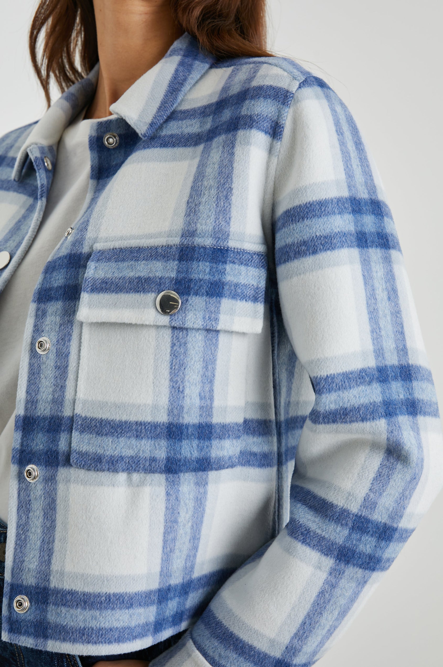 Steffi Jacket with Snap Closure, Snap Cuffs and Two Chest Snap Flap Pockets in Ivory Bay Colorway, an Ivory and Blue Plaid - Front View Featured on Model