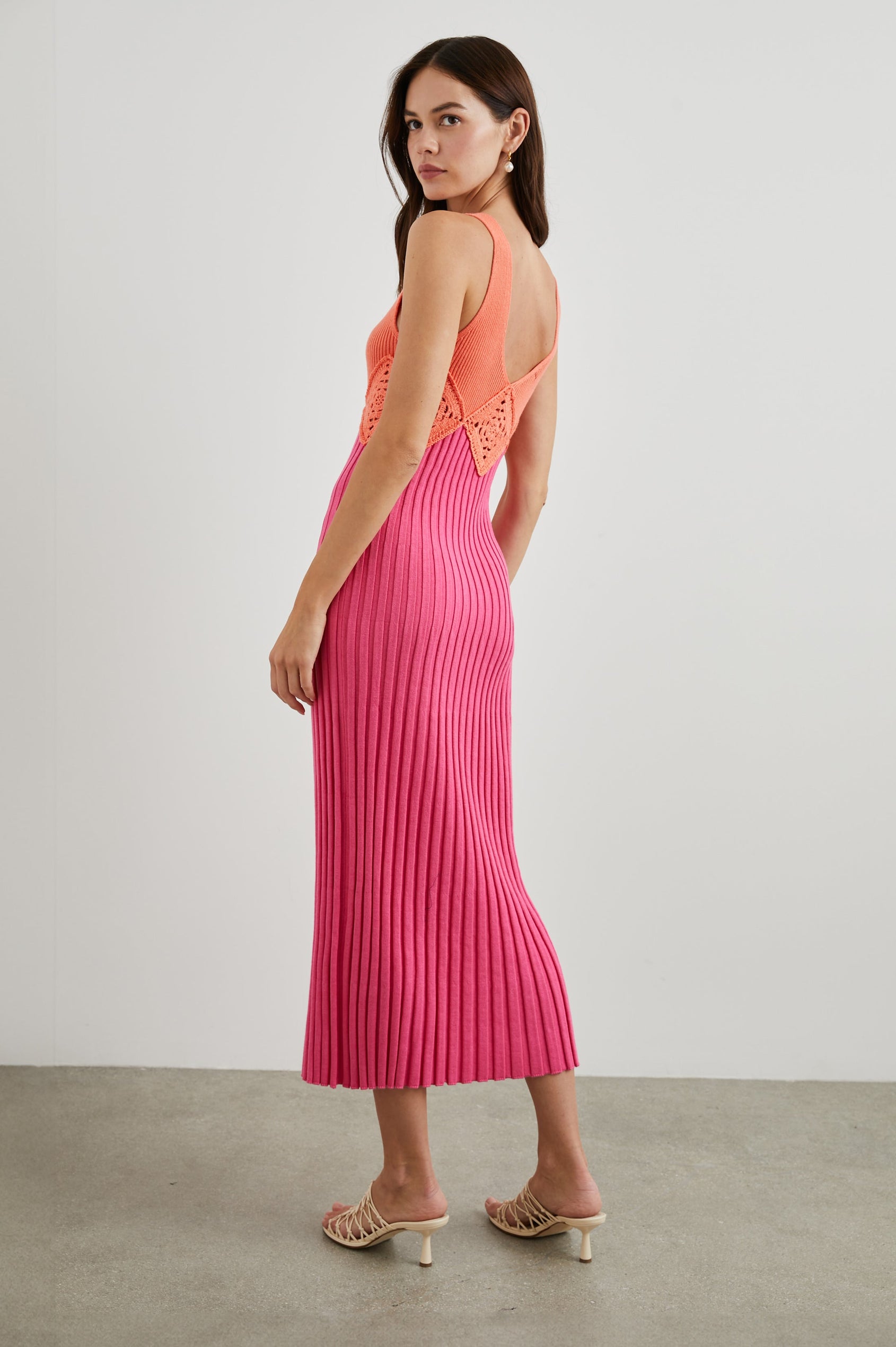 Taryn Sleeveless Ribbed Midi Dress with Shoulder Straps, a Deep Scoop Neck, and Crochet Details Beneath the Bust in Papaya Colorblock Colorway, with a Papaya Bodice and a Pink Skirt - Back Full Body View Featured on Model