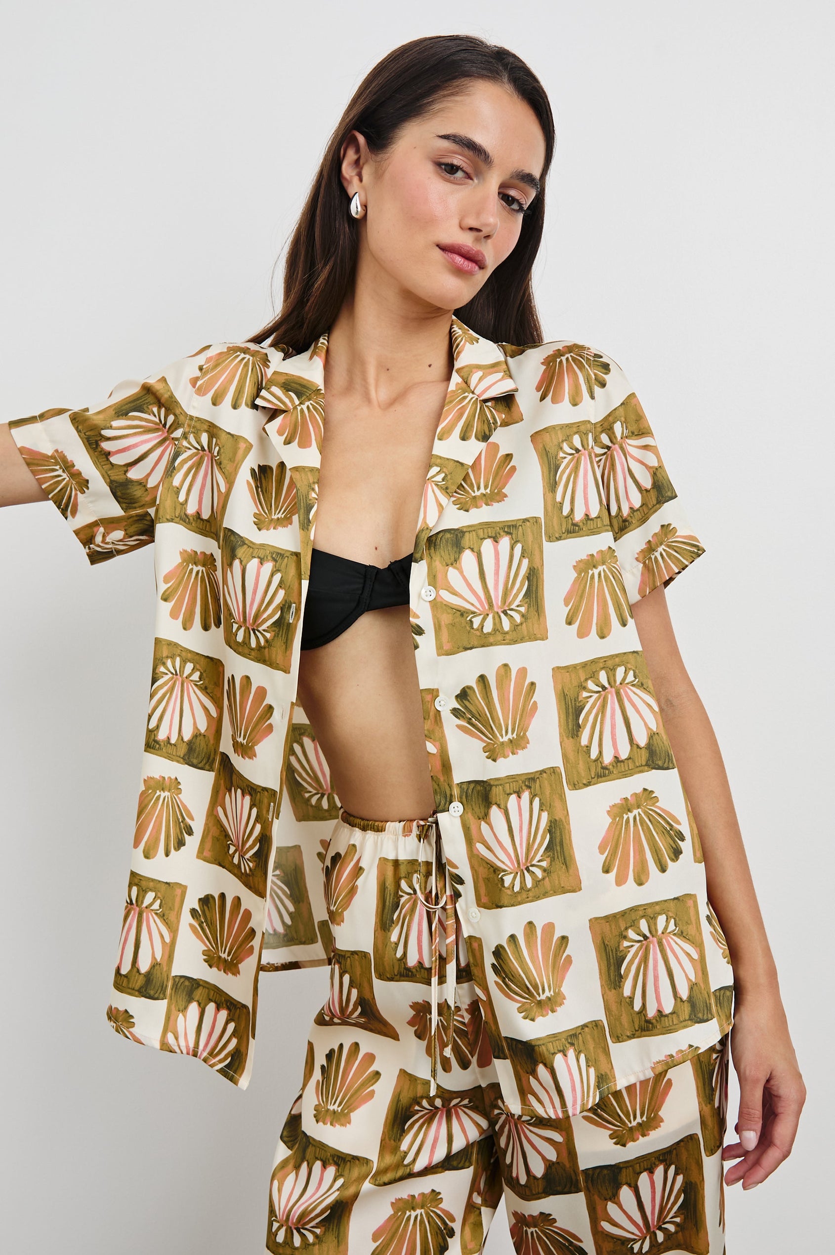 Theis Oversized Collared Button Front Shirt with Short Sleeves in Checkered Shells Colorway. Front View Shown on Model.