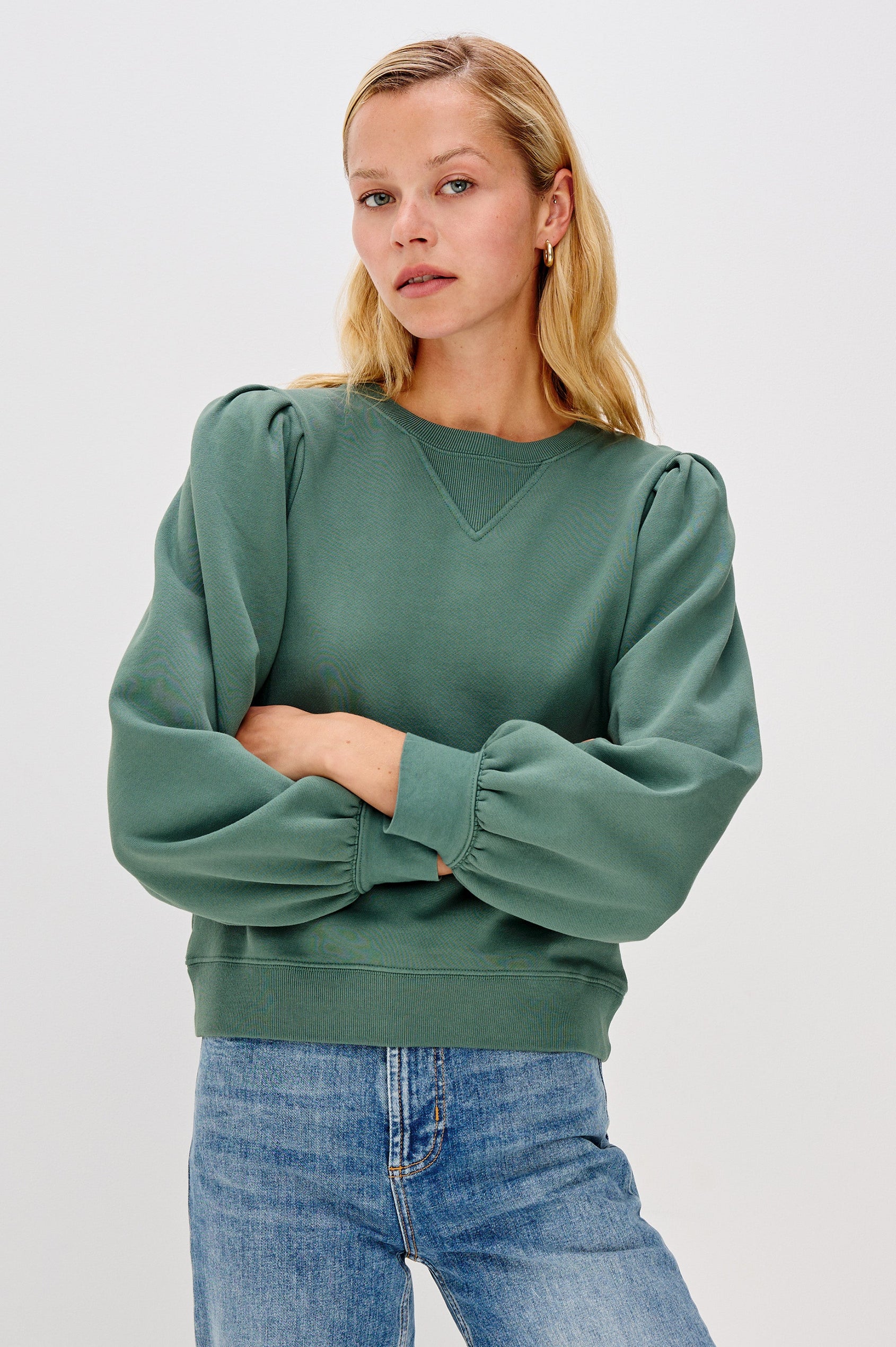 Tiffany Long-Sleeve Sweatshirt with a Crew Neck and Deep Pleated Sleeves in Lake Colorway - Front View Featured on Model with Arms Crossed