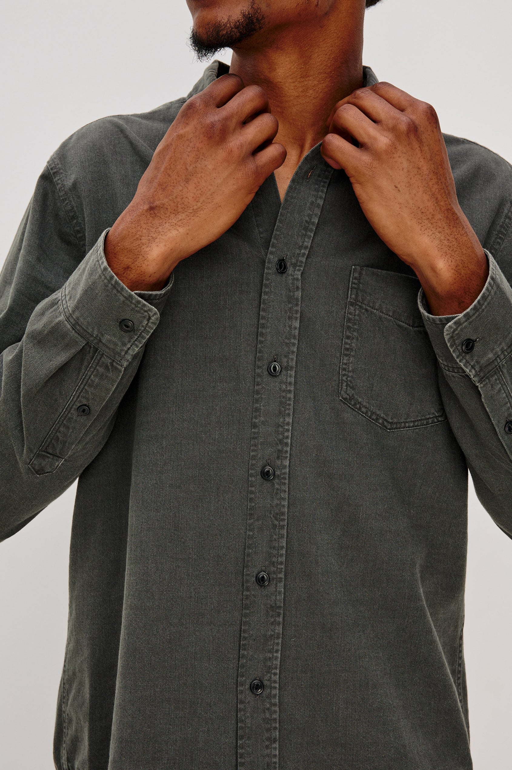 Tristan Long-Sleeve Button Down with a Chest Patch Pocket in Shadow Pass Colorway, a washed black/grey - Front Detail View Featured on Model