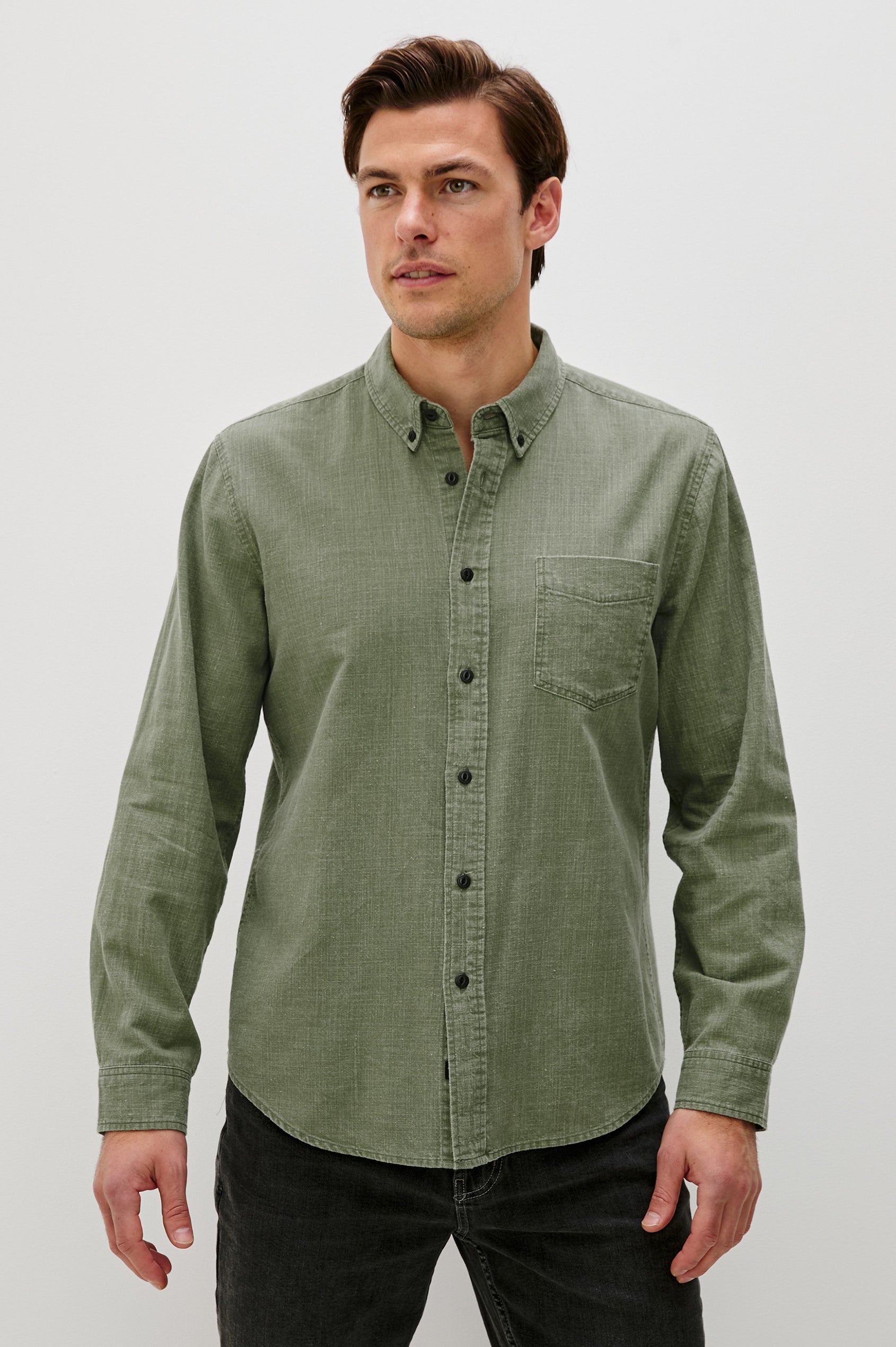 Tristan Long-Sleeve Button Down with a Chest Patch Pocket in Surplus Colorway, a olive green - Front View Featured on Model