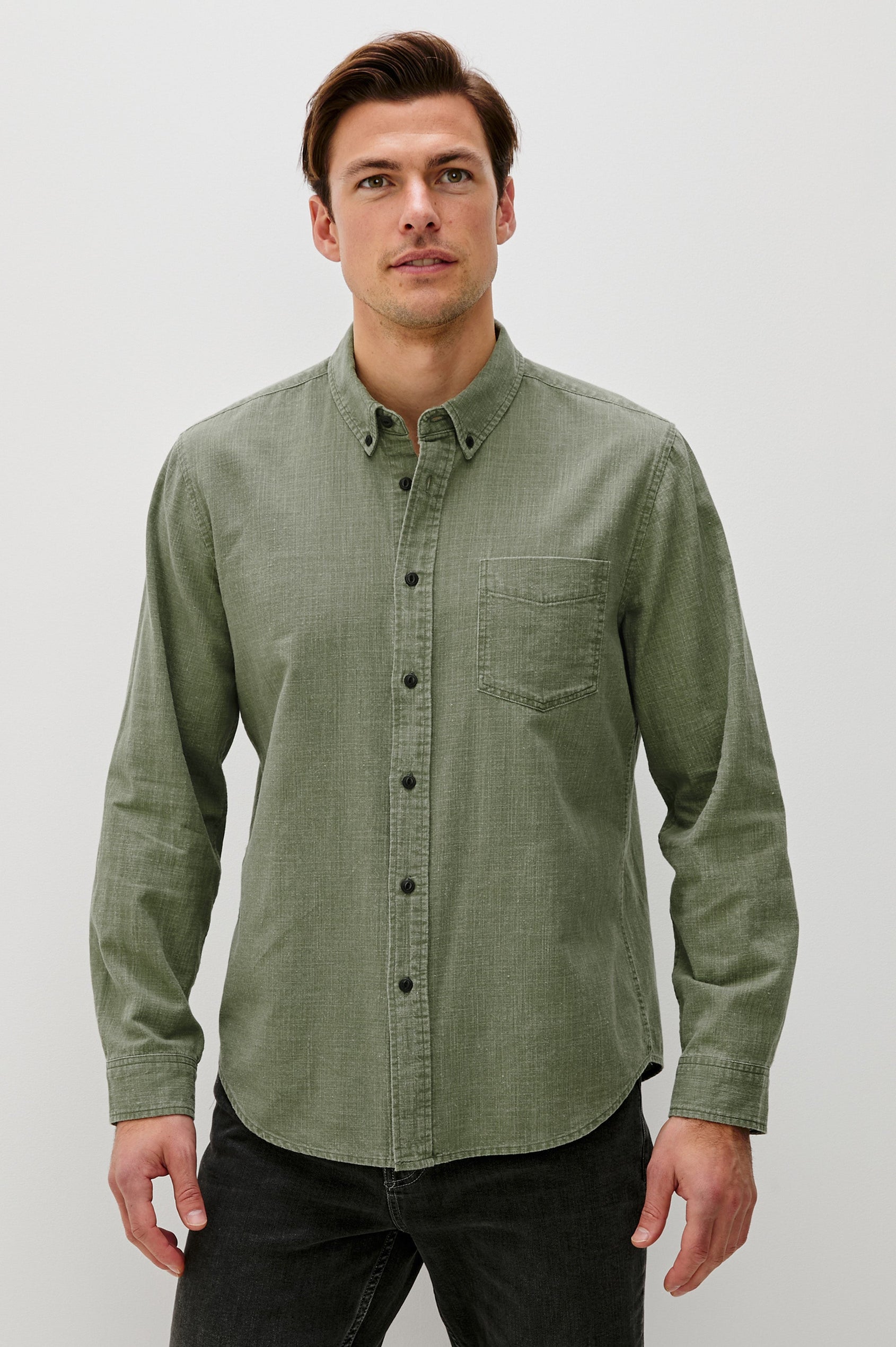 Tristan Long-Sleeve Button Down with a Chest Patch Pocket in Surplus Colorway, a olive green - Front View Featured on Model