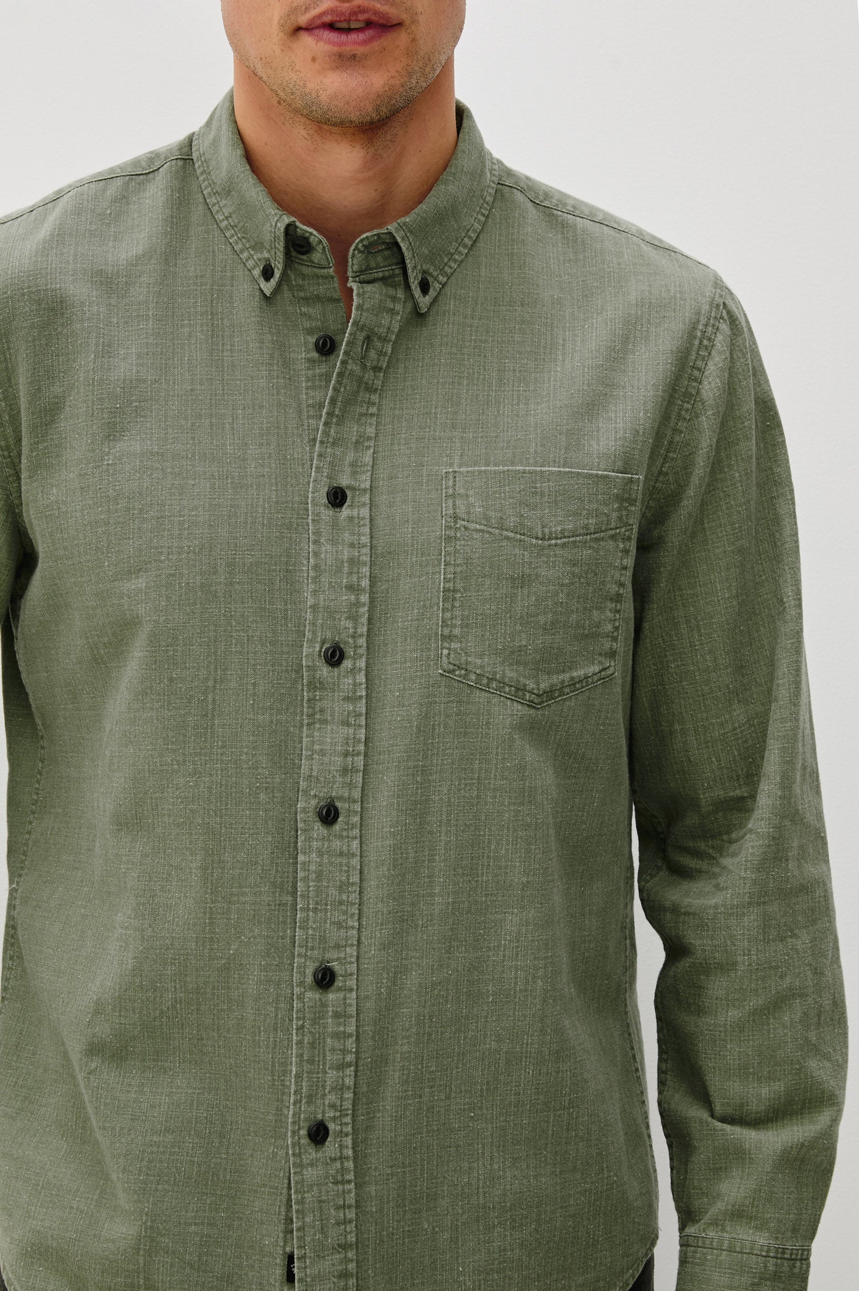 Tristan Long-Sleeve Button Down with a Chest Patch Pocket in Surplus Colorway, a olive green - Front Detail View Featured on Model