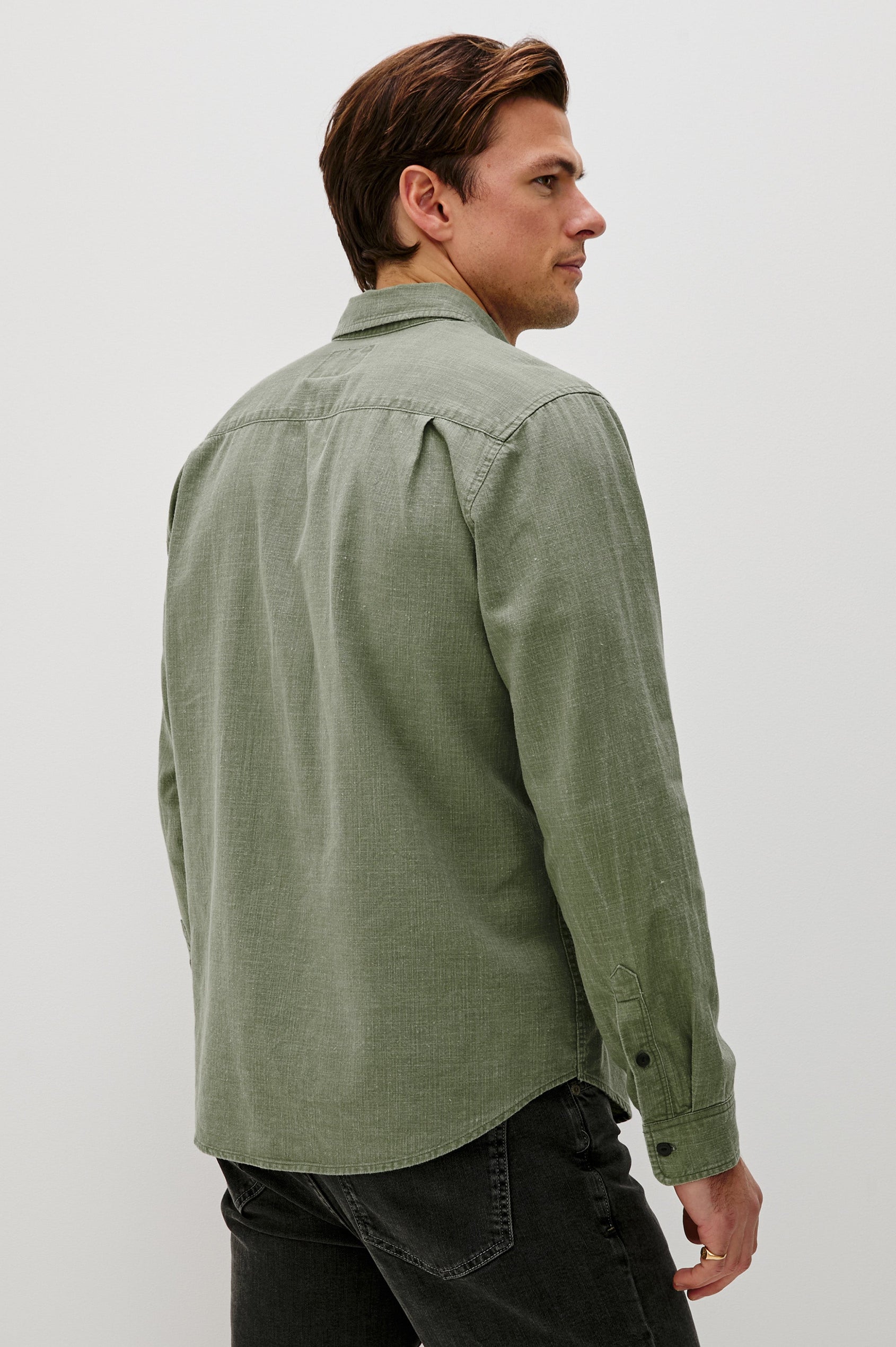 Tristan Long-Sleeve Button Down with a Chest Patch Pocket in Surplus Colorway, a olive green - Back View Featured on Model