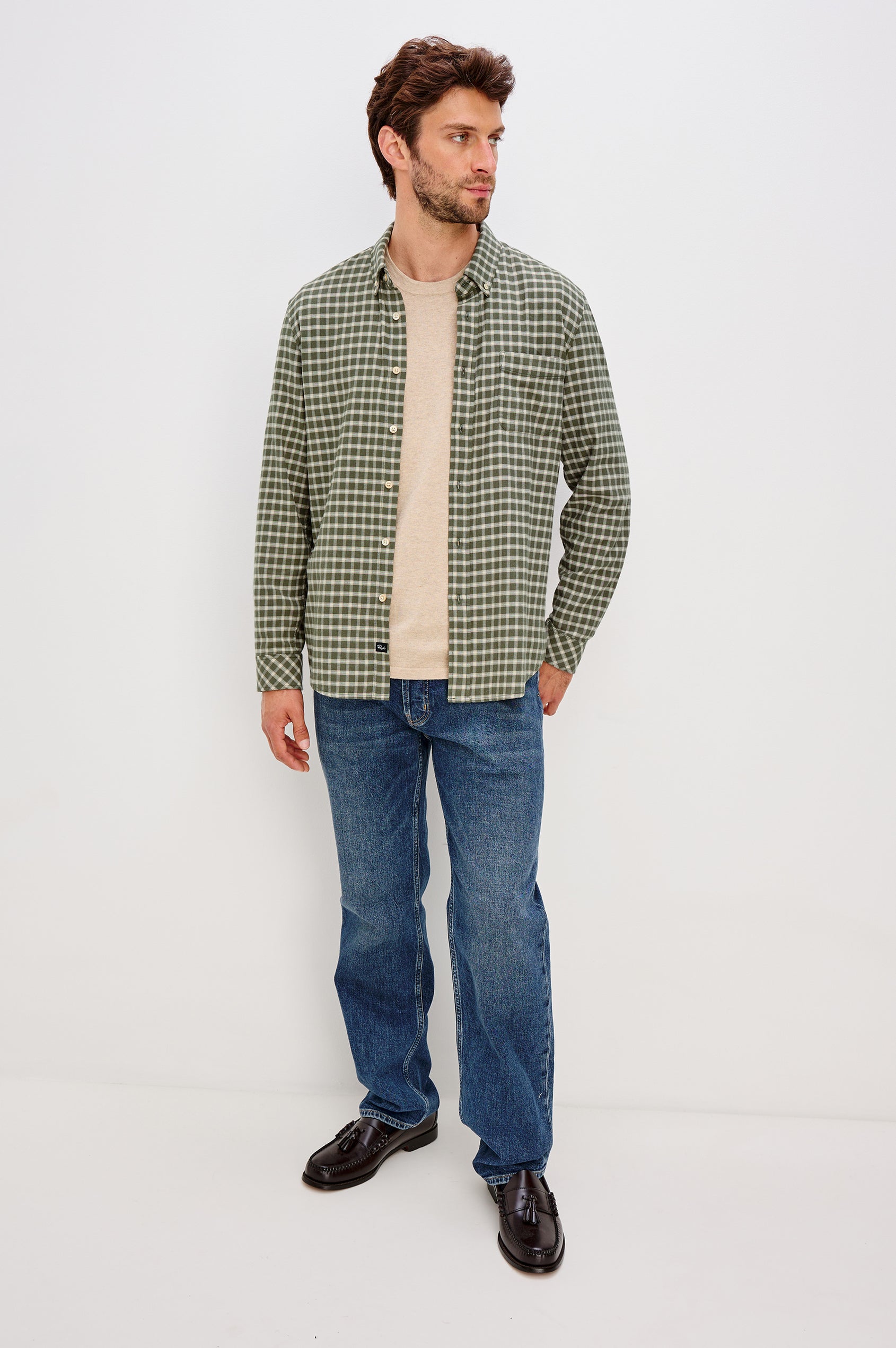 Vance button front collared shirt with long sleeves, collard stand buttons and a single chest pocket in Basil Stone colorway. Front full body view featured on model.