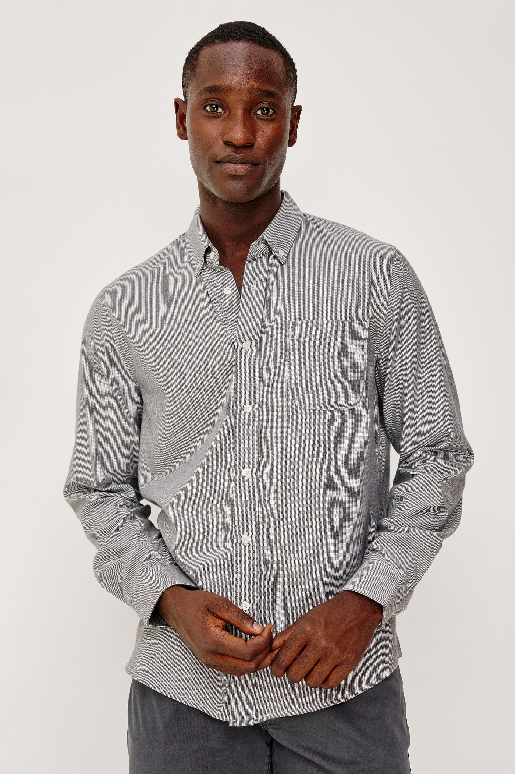 Vance button front collared shirt with long sleeves, collard stand buttons and a single chest pocket in Navy Rope Stripe colorway. Front view shown on model.