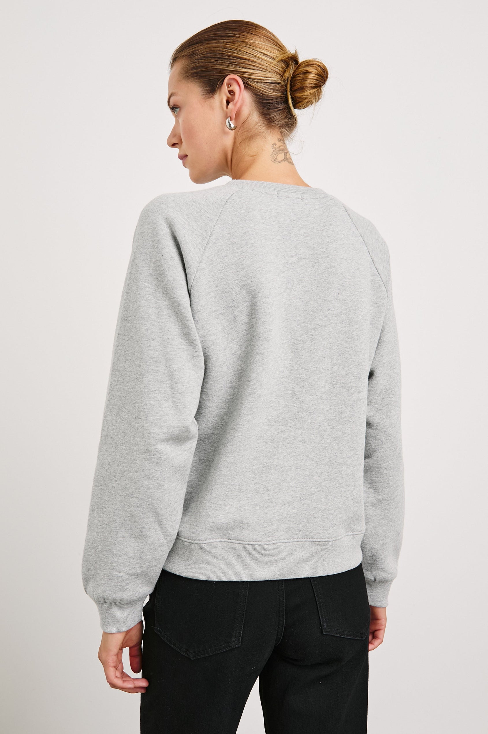 Vintage Raglan Long-Sleeve Sweatshirt with a Crew Neck, an image of landmarks in Los Angeles and the Text, Rails New York City, Hot and Fresh in Rails New York Colorway, Multi Colored on Grey - Back View Featured on Model