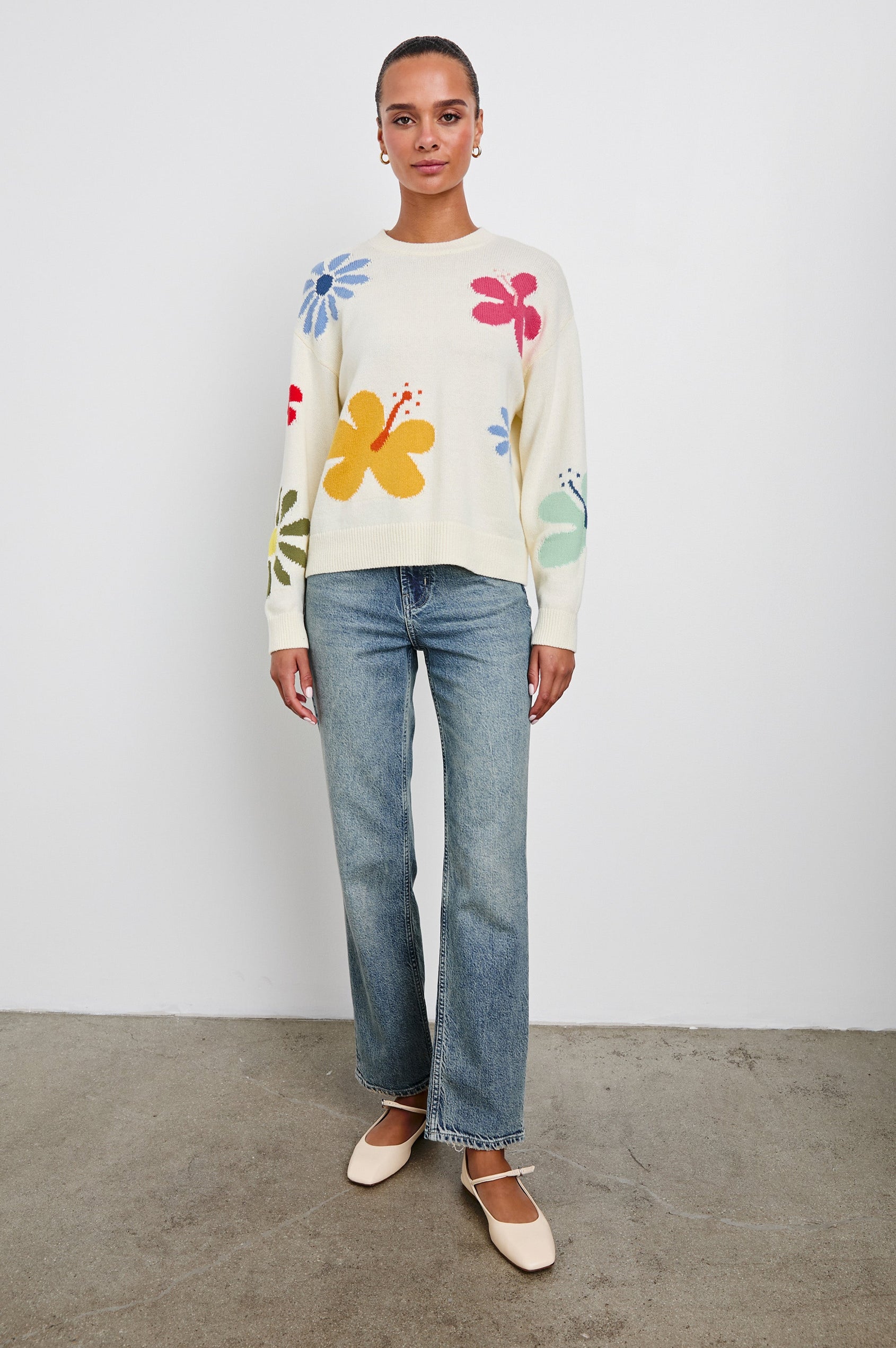 Zoey Long Sleeve Crew Neck Sweater With Multiple Colored Flowers In Colorway Ivory Hibiscus - Full Front Body View Featured On Model