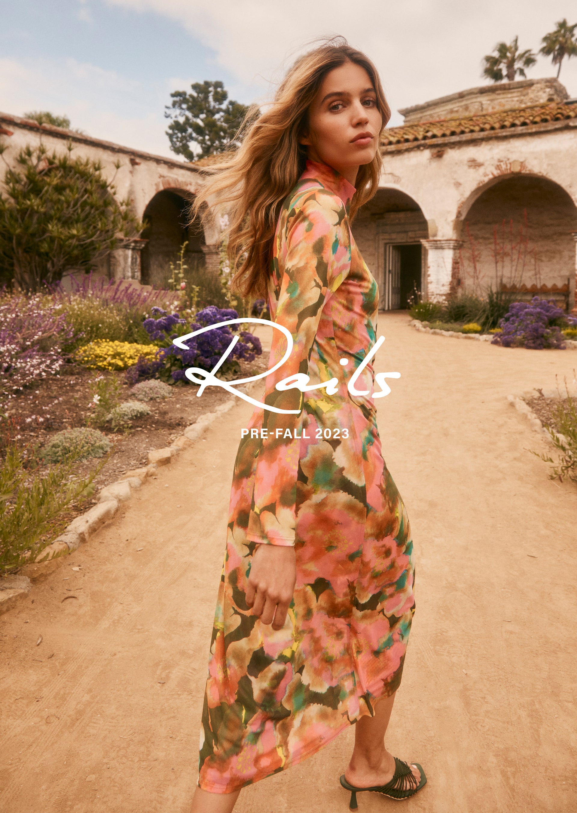 BACK EDITORIAL IMAGE OF MODEL WEARING MONA DRESS