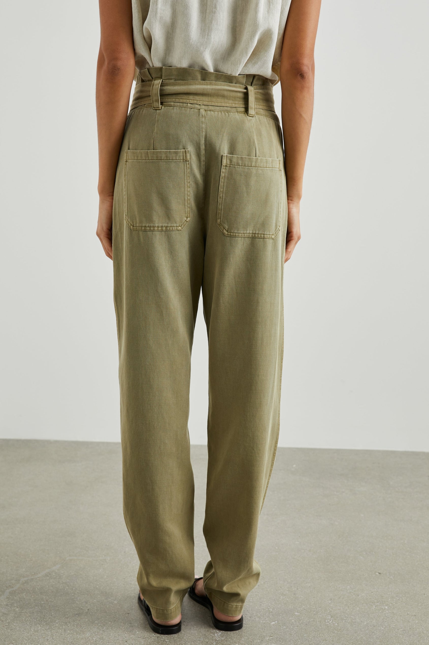 Achilles Pants with Fabric Tie Belt, Two Large Front Pockets, Two Back Patch Pockets and Belt Loops in Canteen Colorway - Back View Featured on Model