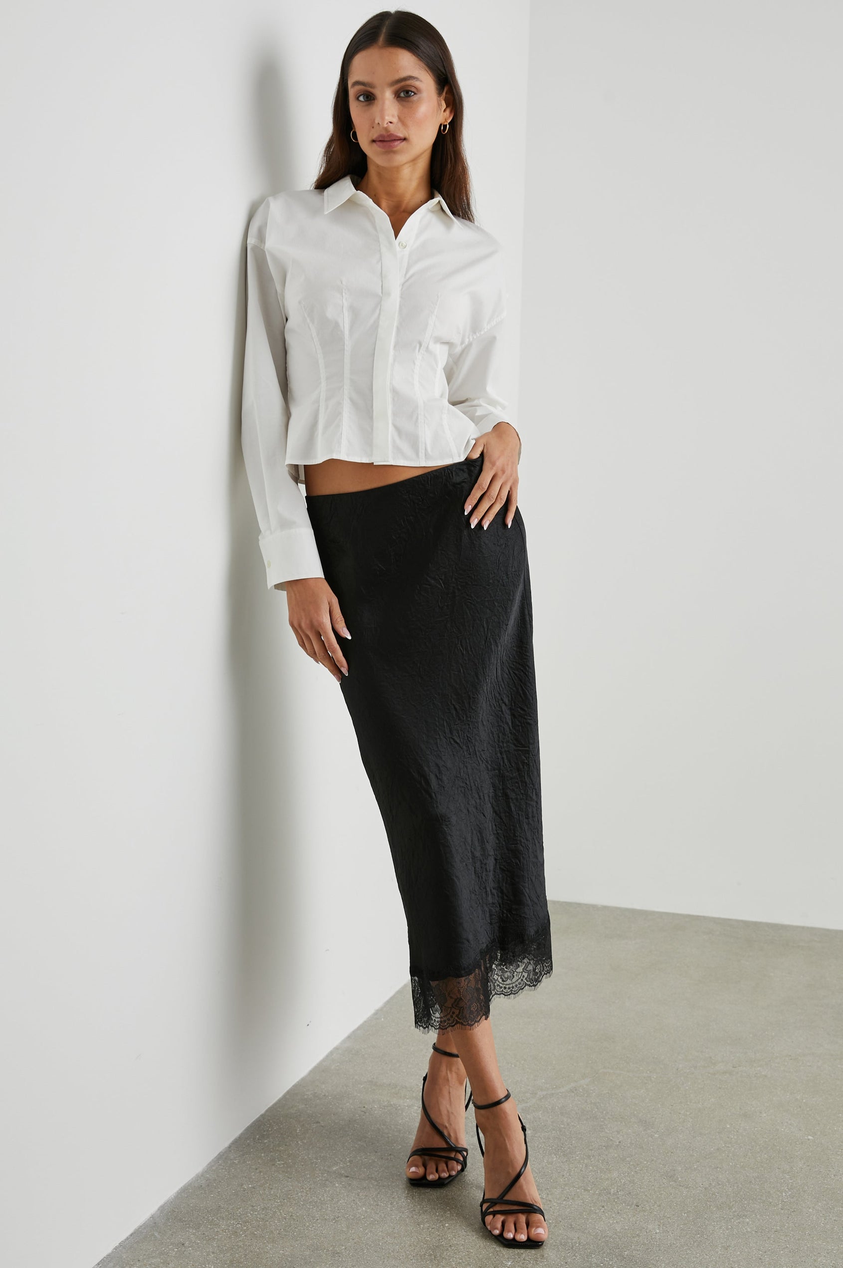 Anabelle Long-Sleeve Cropped Button Down with Vertical Pleats in White Colorway - Front Full Body View Featured on Model