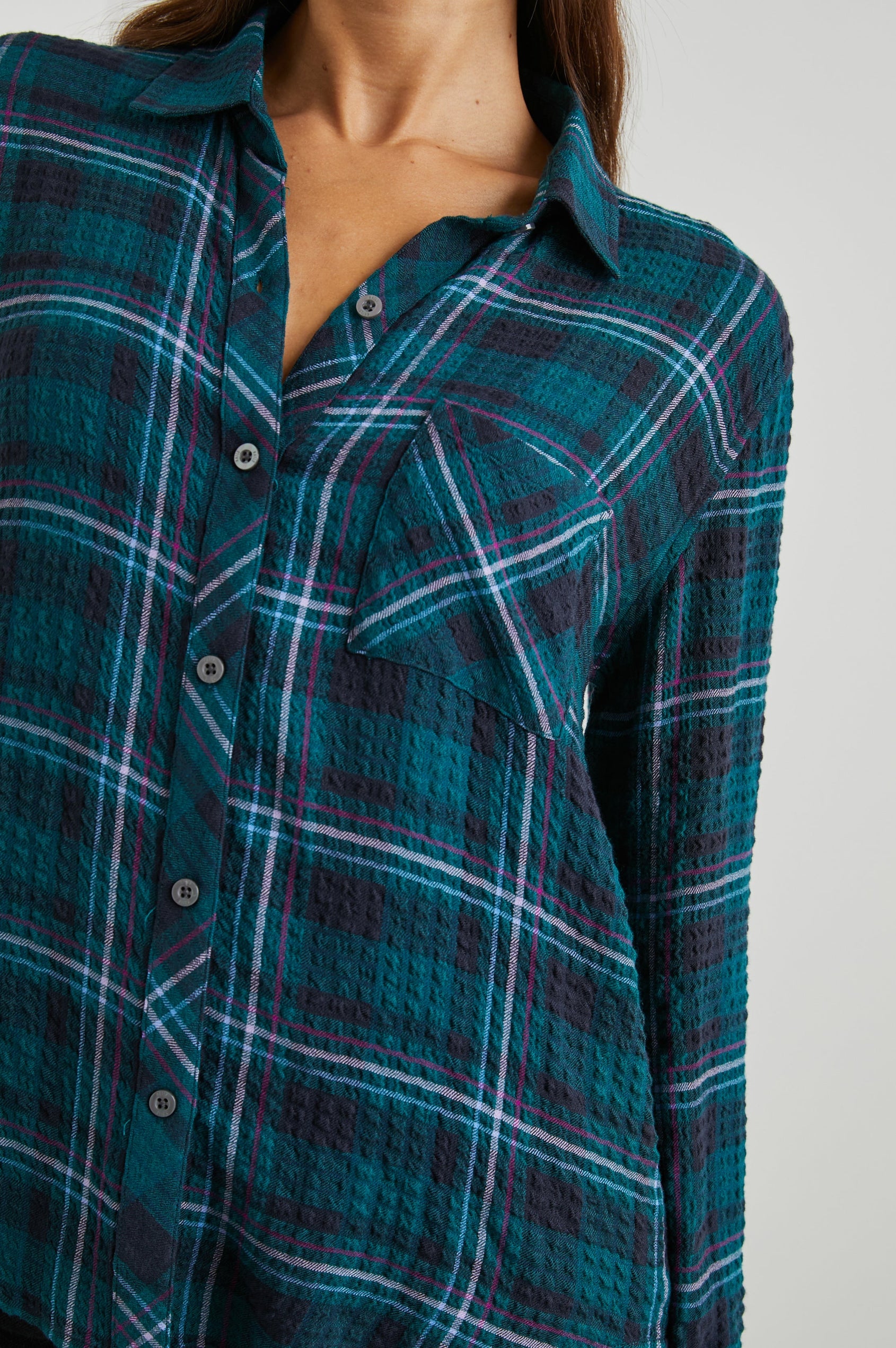 Brady Long-Sleeve Button Up with a Chest Patch Pocket and Textured Fabric in Pine Fuchsia Colorway, a Plaid in Pine, Fushia, Blue and Grey - Front View Featured on Model