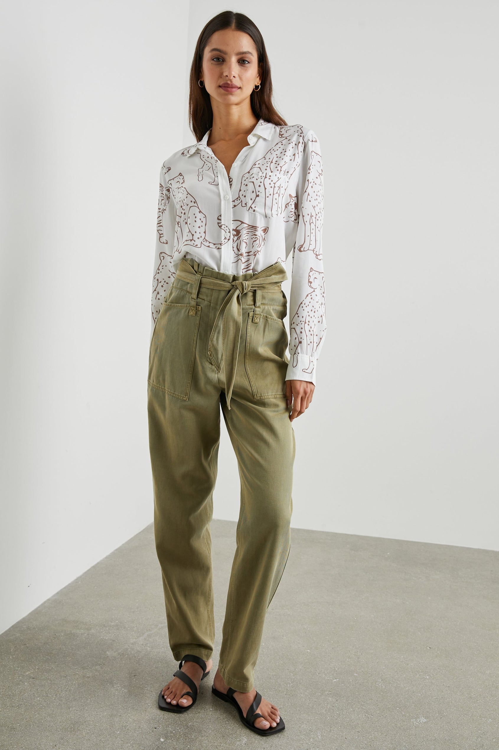 Kathryn Long-Sleeve Button up with a Chest Patch Pocket in Camel Jungle Colorway, with large camel jungle cats on ivory - Front Tucked Full Body View Featured on Model