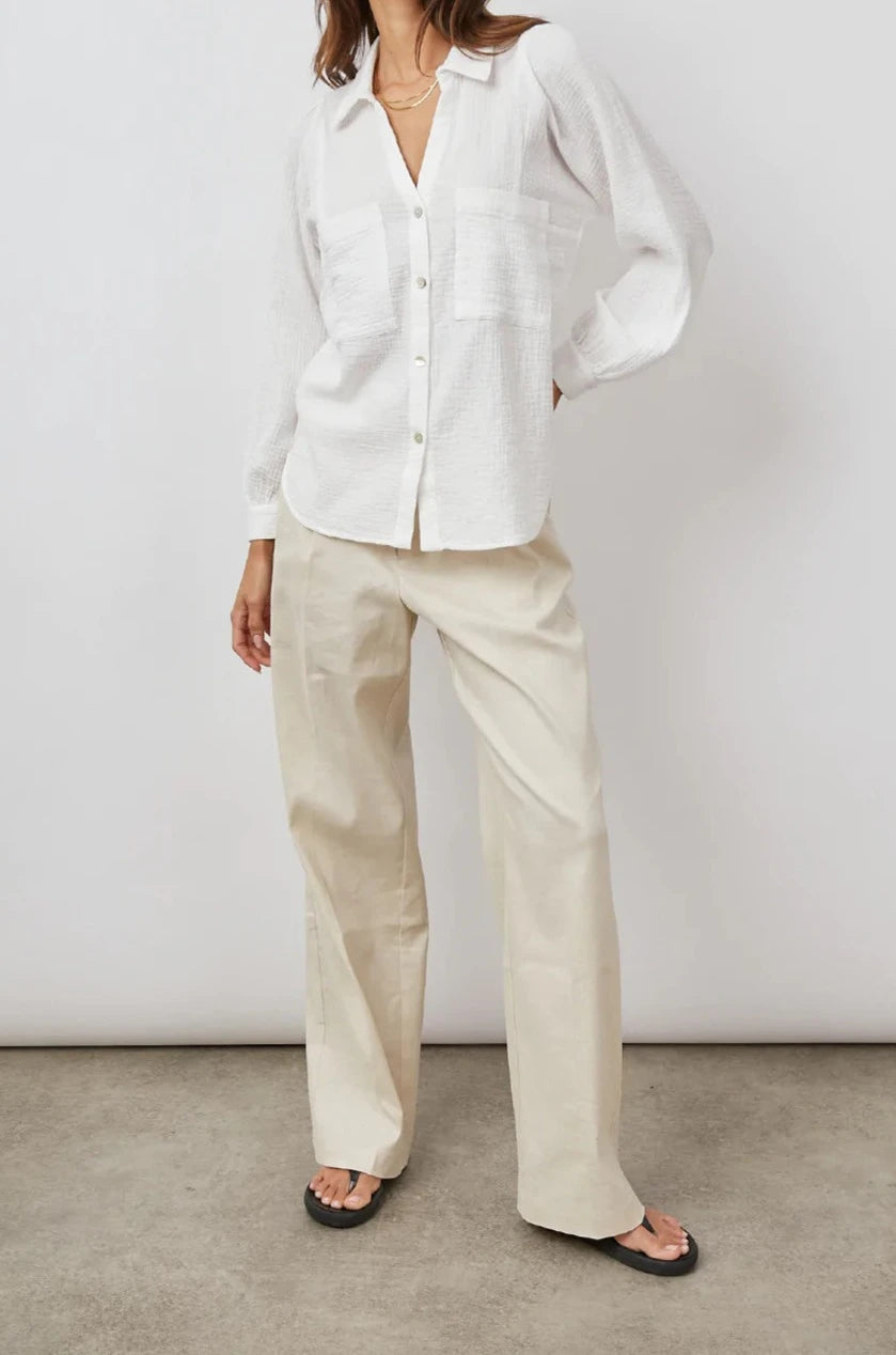 Lauren Long-Sleeve Button Up with Two Chest Patch Pockets and a V Neck in White Colorway - Front Full Body View Featured on Model