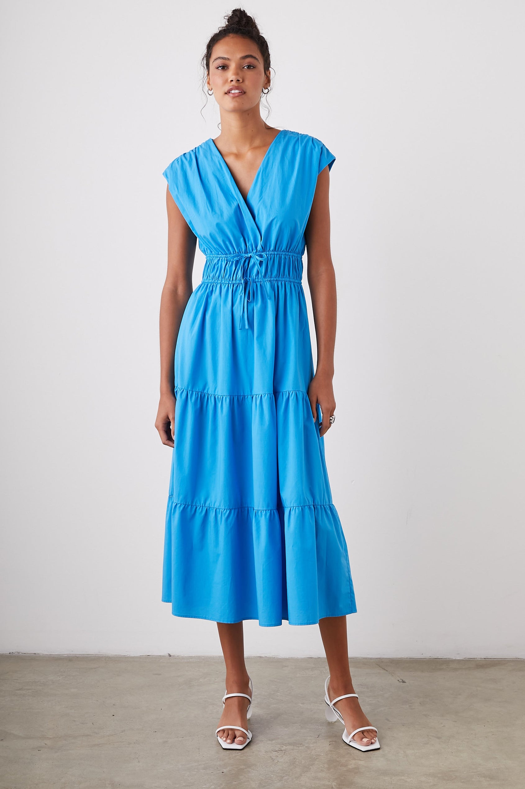 Lucia Midi Dress with Cap Sleeves, a Crossover V neckline, an Elastic Waist with Ties, and a Tiered Skirt in Pacific Colorway - Front Full Body View Featured on Model