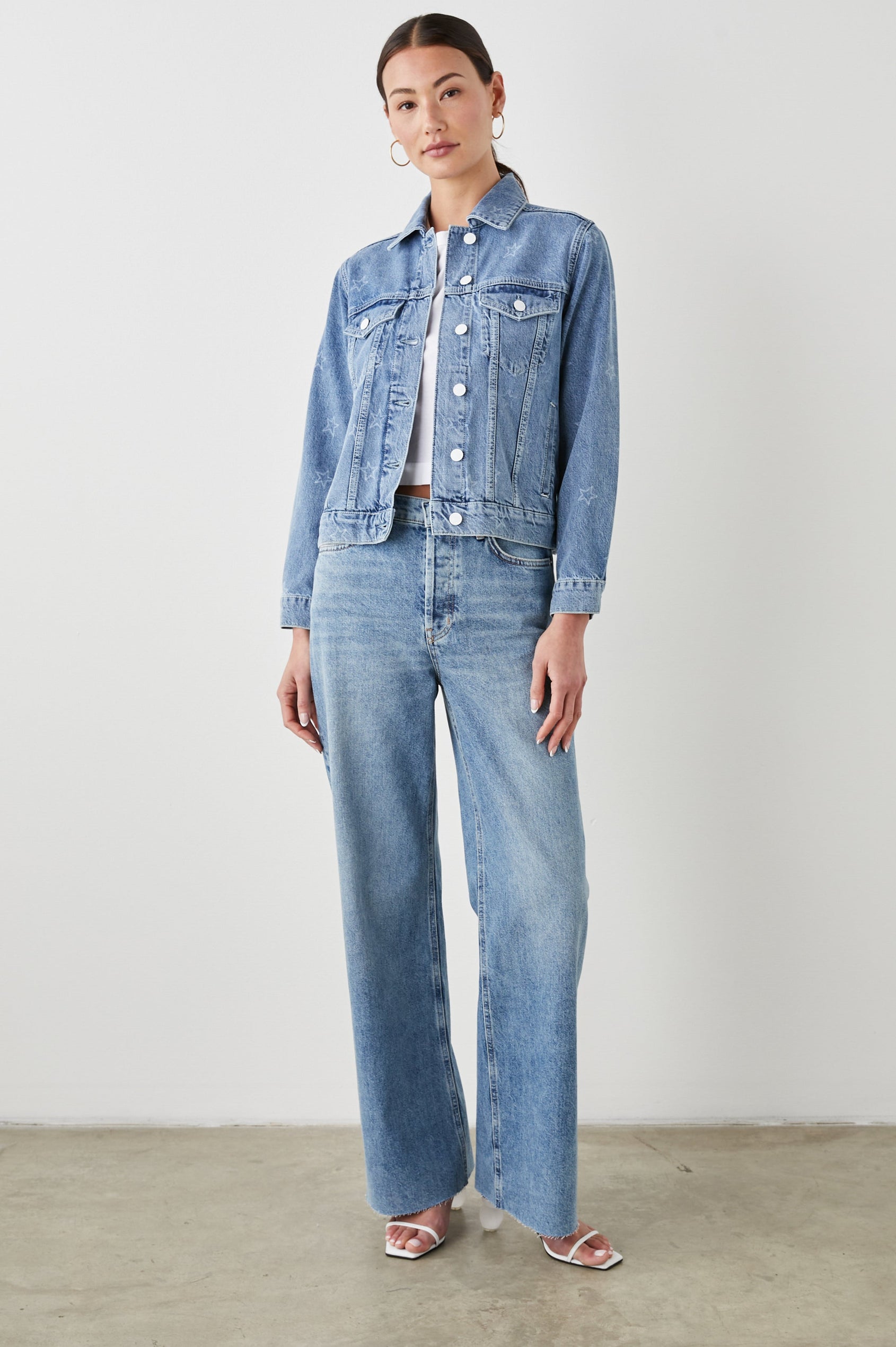 Mulholland Denim Jacket with Button Closure, Two Chest Button Flap Pockets, Two Front Pockets, Adjustable Button Straps on Hem in Lady Liberty Colorway, with White Stars - Front Full Body View Featured on Model