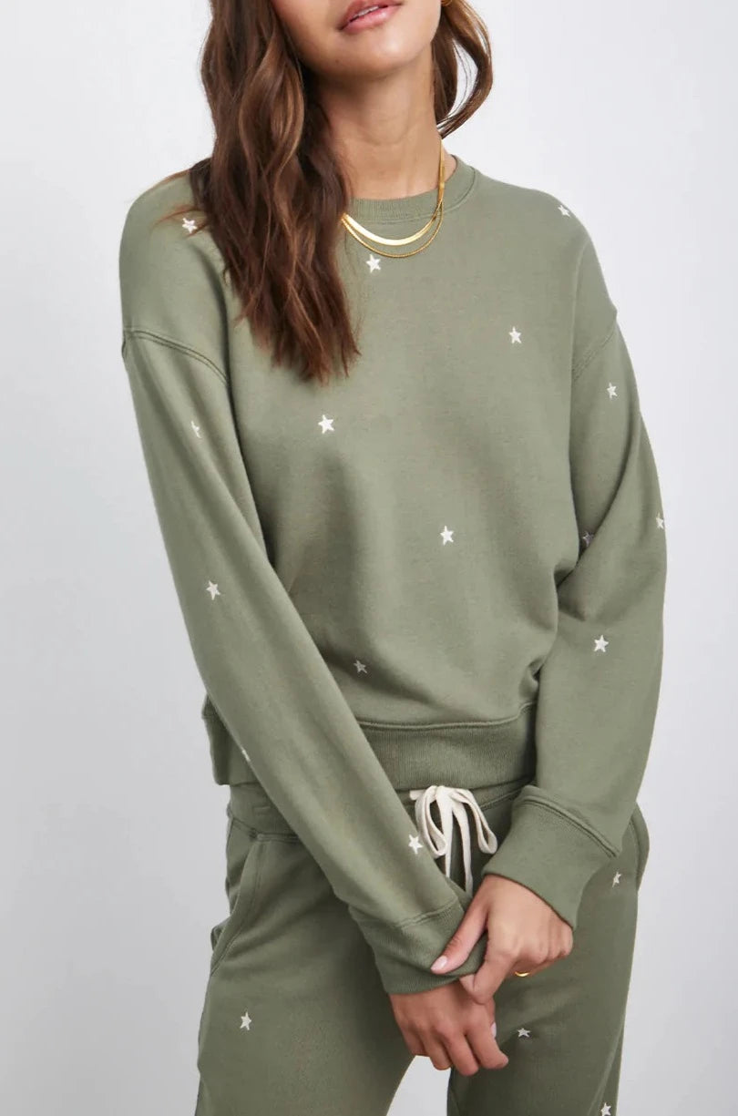 RAMONA OLIVE EMBROIDERED IVORY STARS SWEATER-DETAILFRONT ARMS CROSSED