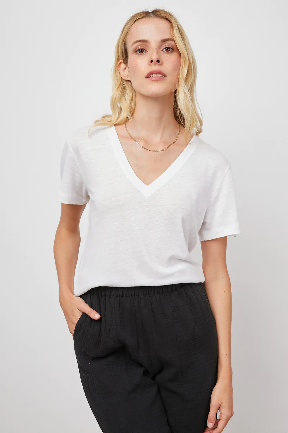 THE CARA V NECK OPTIC WHITE SHIRT-FRONT TUCKED IN