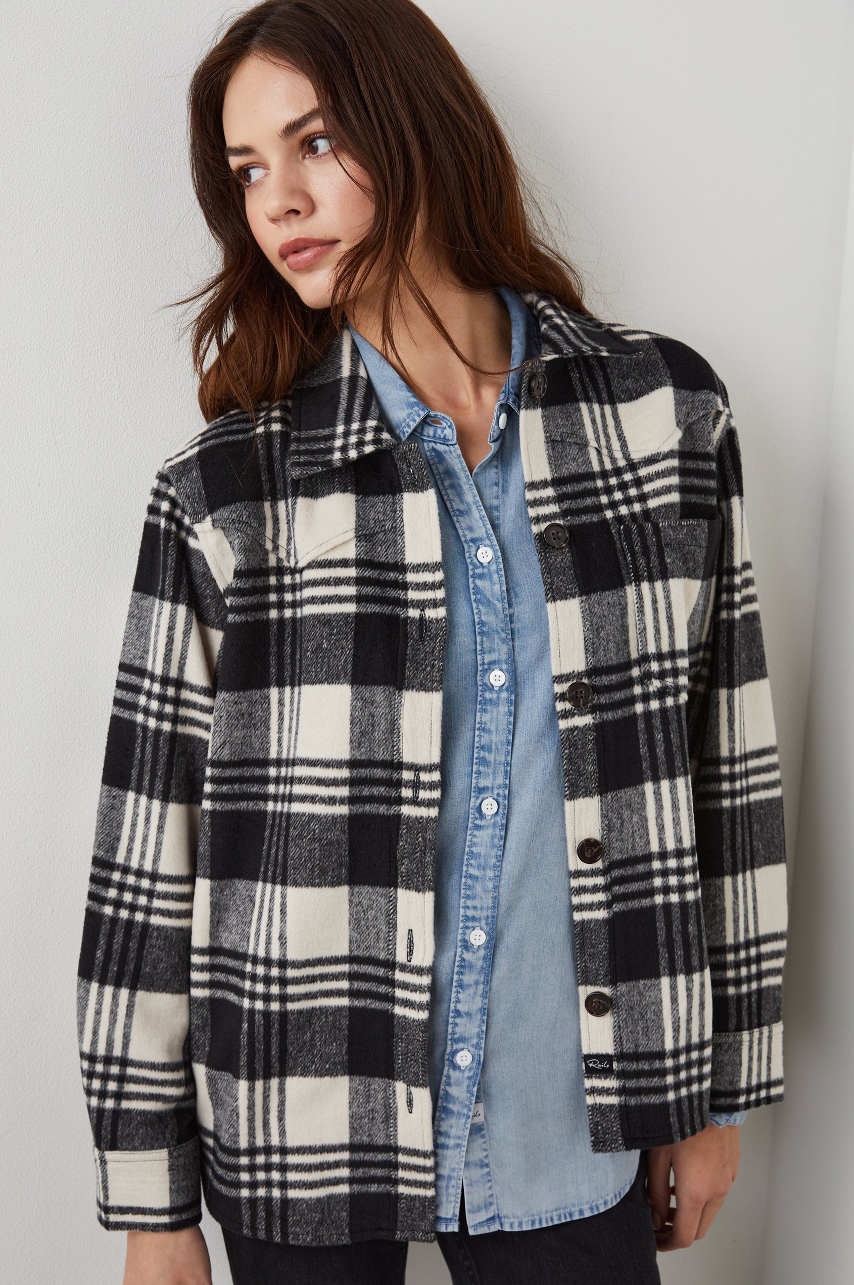 Tripp Shirt Jacket, Long-Sleeve Button Up with a Chest Patch Pocket in Oyster Black Colorway, a Plaid in Cream and Black - Front View Featured on Model