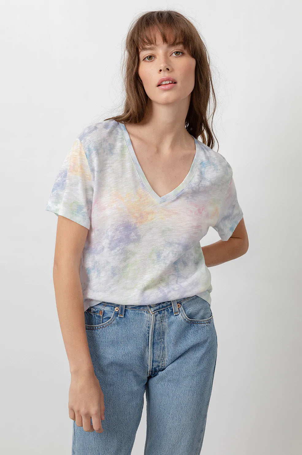 The Cara V-Neck Rainbow Tie Dye Shirt-front tucked in