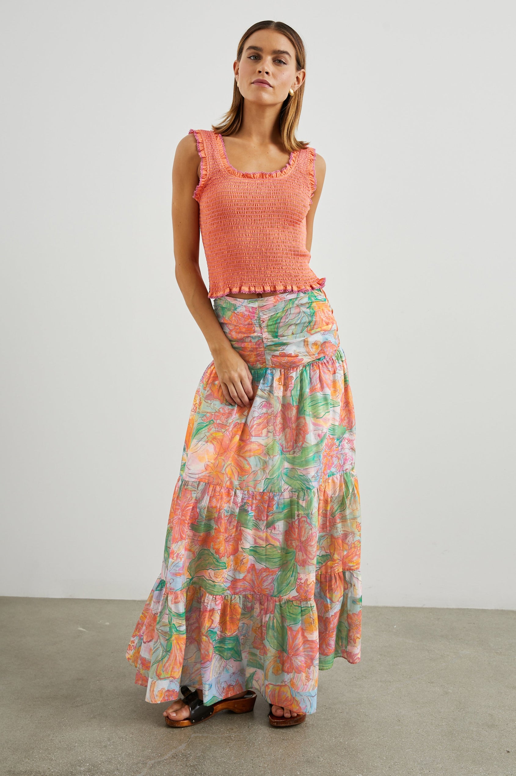 Agatha Maxi Tiered Skirt with Ruching at the Waist in Tropics Colorway, Flowers in Oranges, Pinks and Greens on White - Front View Featured on Model  