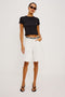 Agoura Short in Rigid Denim With Low Slung Wide Leg Relaxed Fit and Front Zip Fly in Ecru Colorway - Full Body Front View Featured on Model