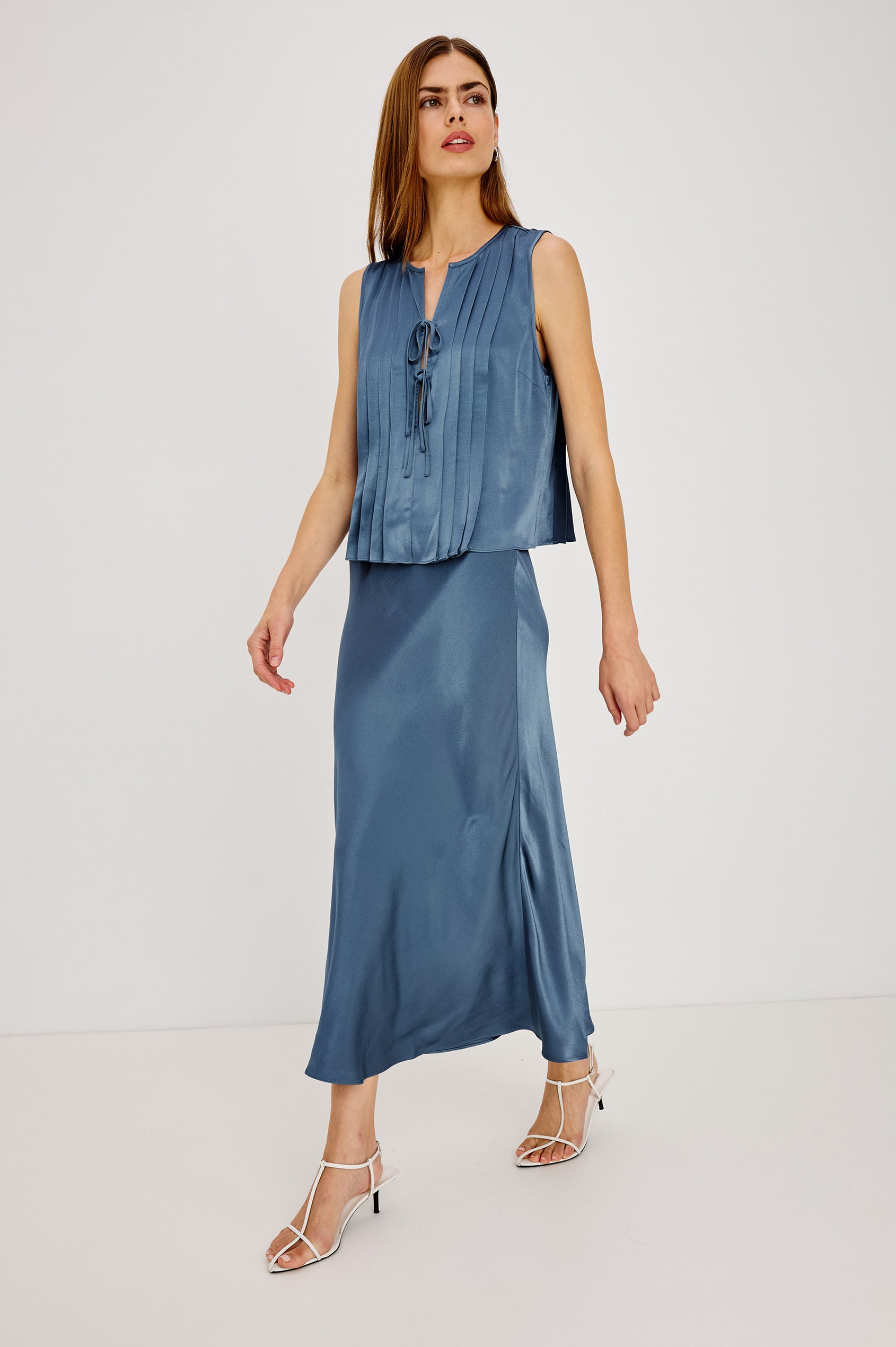 Aja Shirt in Linen Blend With Plunging Split Neckline With Self-Ties, Front Pleats, and Boxy, Cropped Fit in Atlantic Colorway - Full Body Front View Featured on Model