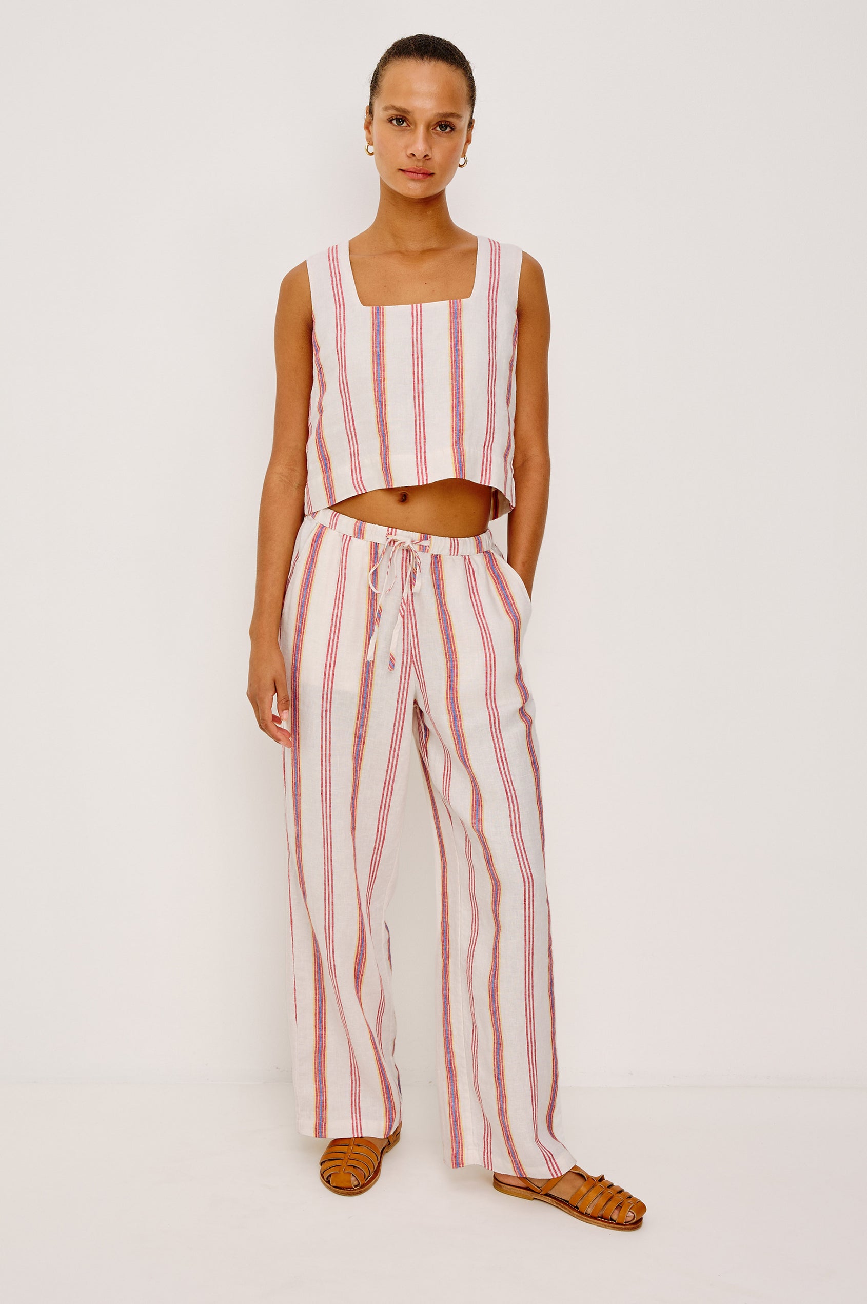 Akira Tank Top in Linen With Square Neckline, Wide Fixed Shoulder Straps, and Cropped Loose Fit in Primavera Stripe Colorway - Full Body Front VIew Featured on Model