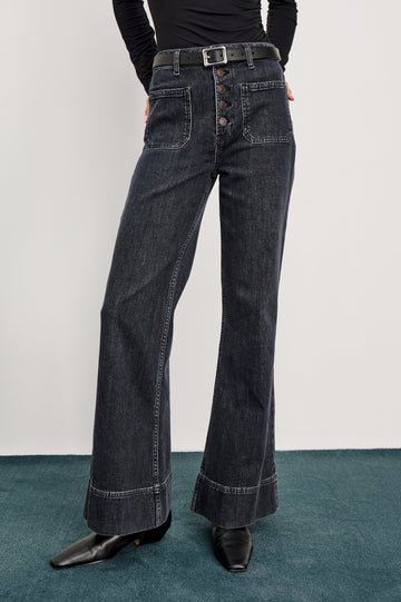 Alamitos high waisted denim trouser with flared leg and front patch pockets in Black Pearl colorway- front view on model