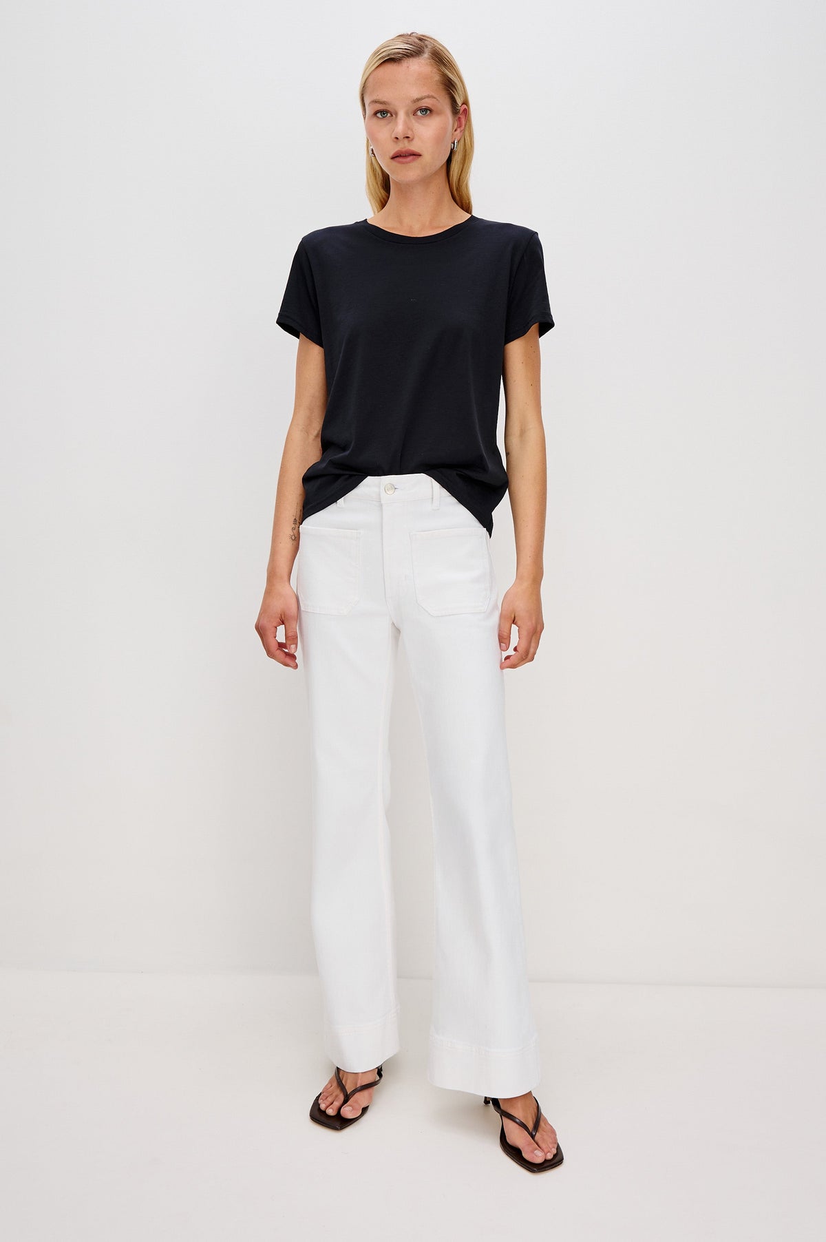 Alamitos Flared Denim Pant with Front Patch Pockets, Belt Loops and Zipper Button Fly in Salt White Colorway. Front Full Body View Shown on Model.