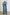 Alamitos high waisted denim trouser with flared leg and front patch pockets in Tradewind - back view on model