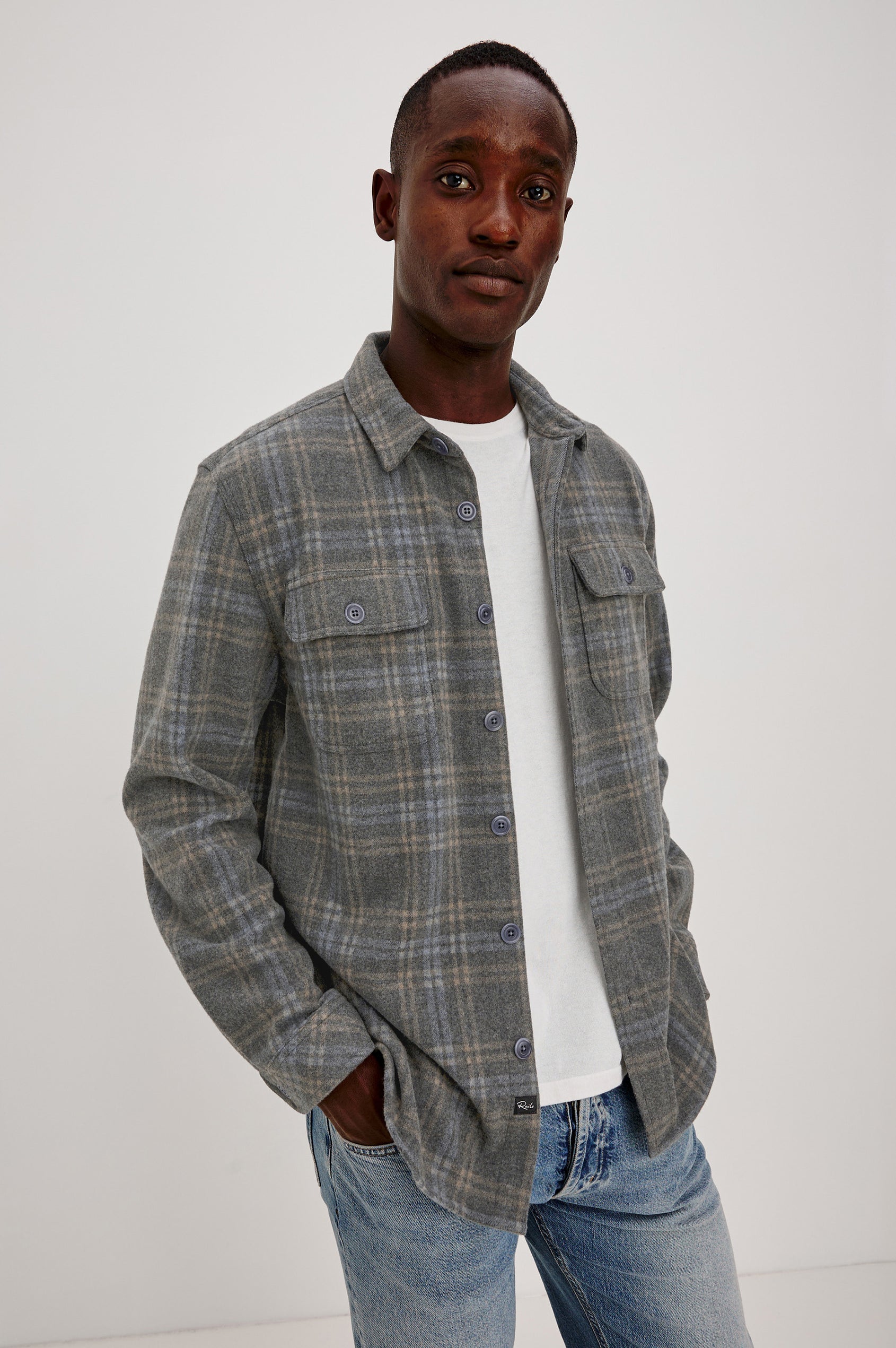 Alder Overshirt in Brushed Flannel With Collar, Button Front, Long Sleeves With Buttoned Cuffs, Back Yoke, Dual Chest Flap Pockets, and Classic Fit in Coastal Iron Heather Colorway - Upper Body Front View Featured on Model