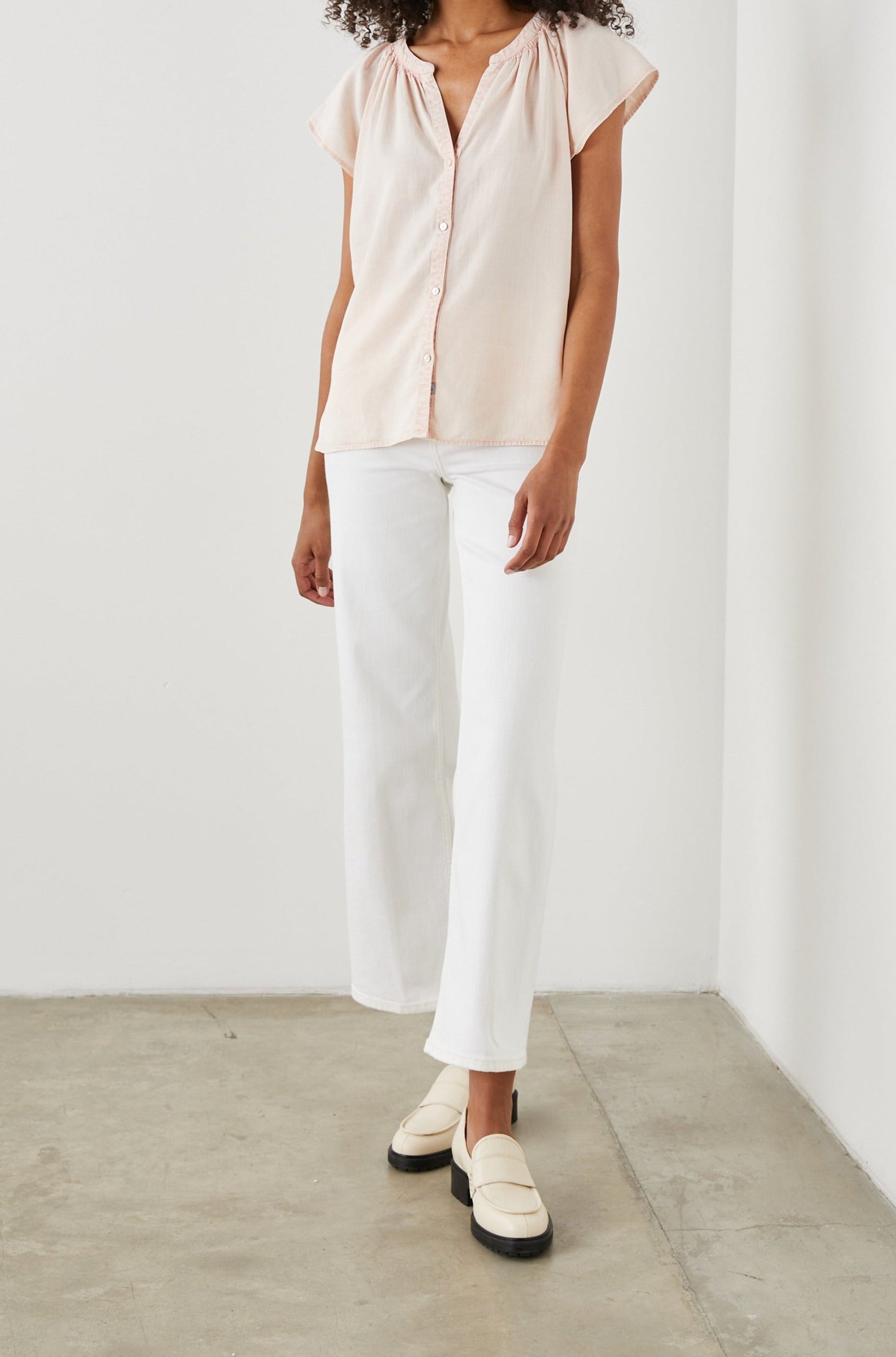 Alena Short Sleeve Top with Flutter Sleeves, a V Neck, Buttons Down the Bodice and Ruching along the Collar in Petal Colorway - Front Full Body View Featured on Model